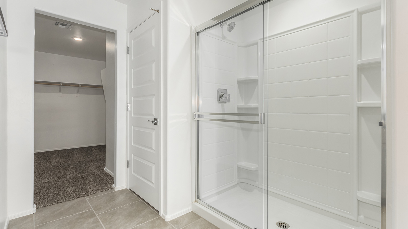 Introducing The Grace at Blackhawk in Tucson, Arizona – a spacious 1,963 sq. ft. two-story new home designed to accommodate modern living with style and functionality.  As you step through the welcoming front porch, you’re greeted by an open and inviting entryway that leads directly into the heart of the home. The main level features a spacious great room that flows seamlessly into the dining area and the modern kitchen, creating a perfect space for entertaining and family gatherings. The kitchen is equipped with elegant granite countertops, a large island with a breakfast bar, modern appliances, and a pantry that offers plenty of storage, making it as functional as it is stylish.  The main floor also includes a convenient powder room for guests, and direct access to the two-car garage, enhancing the home’s functionality and ease of living.  Heading upstairs, you'll discover the family’s private quarters. The master suite is a serene retreat, featuring a generously sized bedroom, a large walk-in closet, and an en-suite bathroom complete with dual vanities and a walk-in shower. The upper level also includes three additional bedrooms, a full bathroom, and a utility room conveniently located for easy access to all bedrooms. Additionally, a versatile loft area serves as a flexible space that can be used as a game room, home office, or even a second living area.  Back downstairs, step outside from the great room to the covered patio, where you can enjoy Tucson’s beautiful weather year-round. Whether you’re hosting an outdoor gathering or simply relaxing after a long day, this space extends your living area and enhances the home’s inviting ambiance.  Designed with energy efficiency in mind, The Grace at Blackhawk is a DOE Zero Energy Ready Home, ensuring sustainability, comfort, and long-term savings.