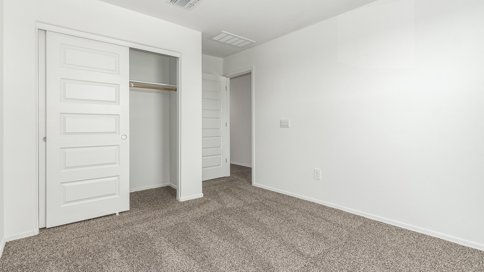 Introducing The Grace at Blackhawk in Tucson, Arizona – a spacious 1,963 sq. ft. two-story new home designed to accommodate modern living with style and functionality.  As you step through the welcoming front porch, you’re greeted by an open and inviting entryway that leads directly into the heart of the home. The main level features a spacious great room that flows seamlessly into the dining area and the modern kitchen, creating a perfect space for entertaining and family gatherings. The kitchen is equipped with elegant granite countertops, a large island with a breakfast bar, modern appliances, and a pantry that offers plenty of storage, making it as functional as it is stylish.  The main floor also includes a convenient powder room for guests, and direct access to the two-car garage, enhancing the home’s functionality and ease of living.  Heading upstairs, you'll discover the family’s private quarters. The master suite is a serene retreat, featuring a generously sized bedroom, a large walk-in closet, and an en-suite bathroom complete with dual vanities and a walk-in shower. The upper level also includes three additional bedrooms, a full bathroom, and a utility room conveniently located for easy access to all bedrooms. Additionally, a versatile loft area serves as a flexible space that can be used as a game room, home office, or even a second living area.  Back downstairs, step outside from the great room to the covered patio, where you can enjoy Tucson’s beautiful weather year-round. Whether you’re hosting an outdoor gathering or simply relaxing after a long day, this space extends your living area and enhances the home’s inviting ambiance.  Designed with energy efficiency in mind, The Grace at Blackhawk is a DOE Zero Energy Ready Home, ensuring sustainability, comfort, and long-term savings.