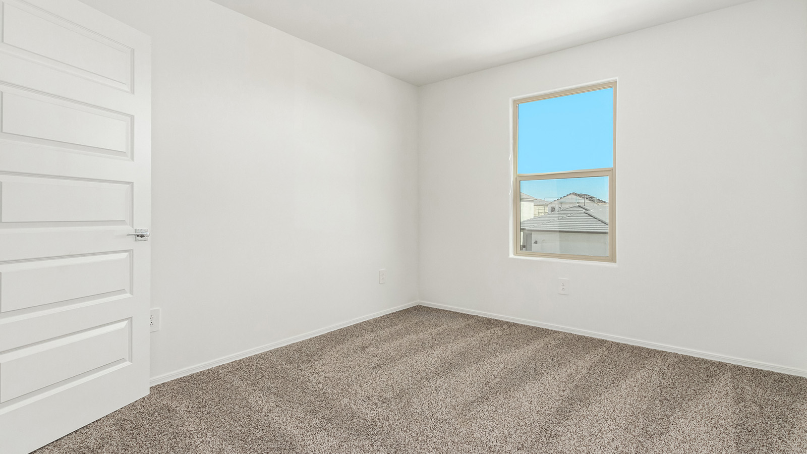 Introducing The Grace at Blackhawk in Tucson, Arizona – a spacious 1,963 sq. ft. two-story new home designed to accommodate modern living with style and functionality.  As you step through the welcoming front porch, you’re greeted by an open and inviting entryway that leads directly into the heart of the home. The main level features a spacious great room that flows seamlessly into the dining area and the modern kitchen, creating a perfect space for entertaining and family gatherings. The kitchen is equipped with elegant granite countertops, a large island with a breakfast bar, modern appliances, and a pantry that offers plenty of storage, making it as functional as it is stylish.  The main floor also includes a convenient powder room for guests, and direct access to the two-car garage, enhancing the home’s functionality and ease of living.  Heading upstairs, you'll discover the family’s private quarters. The master suite is a serene retreat, featuring a generously sized bedroom, a large walk-in closet, and an en-suite bathroom complete with dual vanities and a walk-in shower. The upper level also includes three additional bedrooms, a full bathroom, and a utility room conveniently located for easy access to all bedrooms. Additionally, a versatile loft area serves as a flexible space that can be used as a game room, home office, or even a second living area.  Back downstairs, step outside from the great room to the covered patio, where you can enjoy Tucson’s beautiful weather year-round. Whether you’re hosting an outdoor gathering or simply relaxing after a long day, this space extends your living area and enhances the home’s inviting ambiance.  Designed with energy efficiency in mind, The Grace at Blackhawk is a DOE Zero Energy Ready Home, ensuring sustainability, comfort, and long-term savings.