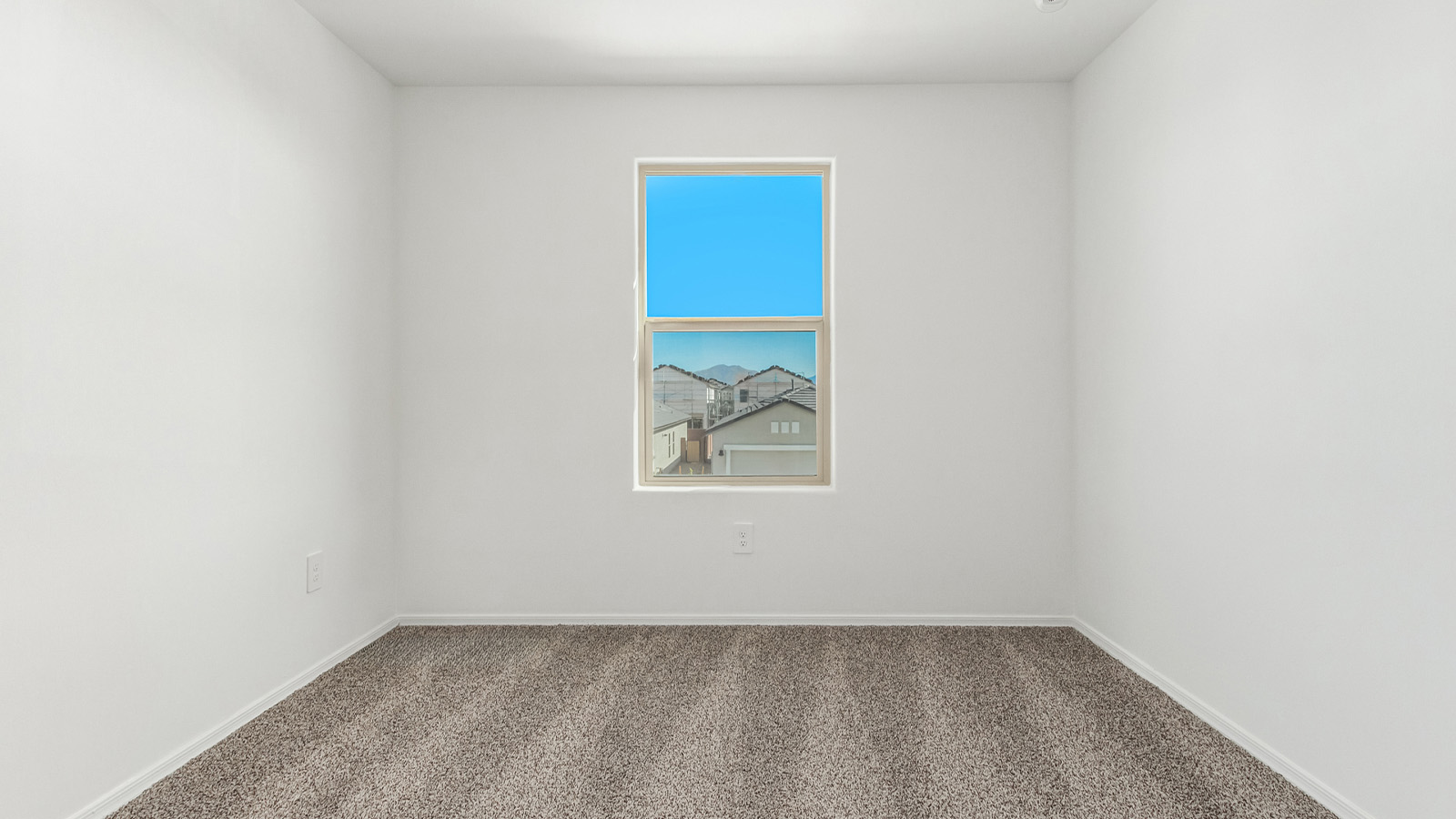 Introducing The Grace at Blackhawk in Tucson, Arizona – a spacious 1,963 sq. ft. two-story new home designed to accommodate modern living with style and functionality.  As you step through the welcoming front porch, you’re greeted by an open and inviting entryway that leads directly into the heart of the home. The main level features a spacious great room that flows seamlessly into the dining area and the modern kitchen, creating a perfect space for entertaining and family gatherings. The kitchen is equipped with elegant granite countertops, a large island with a breakfast bar, modern appliances, and a pantry that offers plenty of storage, making it as functional as it is stylish.  The main floor also includes a convenient powder room for guests, and direct access to the two-car garage, enhancing the home’s functionality and ease of living.  Heading upstairs, you'll discover the family’s private quarters. The master suite is a serene retreat, featuring a generously sized bedroom, a large walk-in closet, and an en-suite bathroom complete with dual vanities and a walk-in shower. The upper level also includes three additional bedrooms, a full bathroom, and a utility room conveniently located for easy access to all bedrooms. Additionally, a versatile loft area serves as a flexible space that can be used as a game room, home office, or even a second living area.  Back downstairs, step outside from the great room to the covered patio, where you can enjoy Tucson’s beautiful weather year-round. Whether you’re hosting an outdoor gathering or simply relaxing after a long day, this space extends your living area and enhances the home’s inviting ambiance.  Designed with energy efficiency in mind, The Grace at Blackhawk is a DOE Zero Energy Ready Home, ensuring sustainability, comfort, and long-term savings.