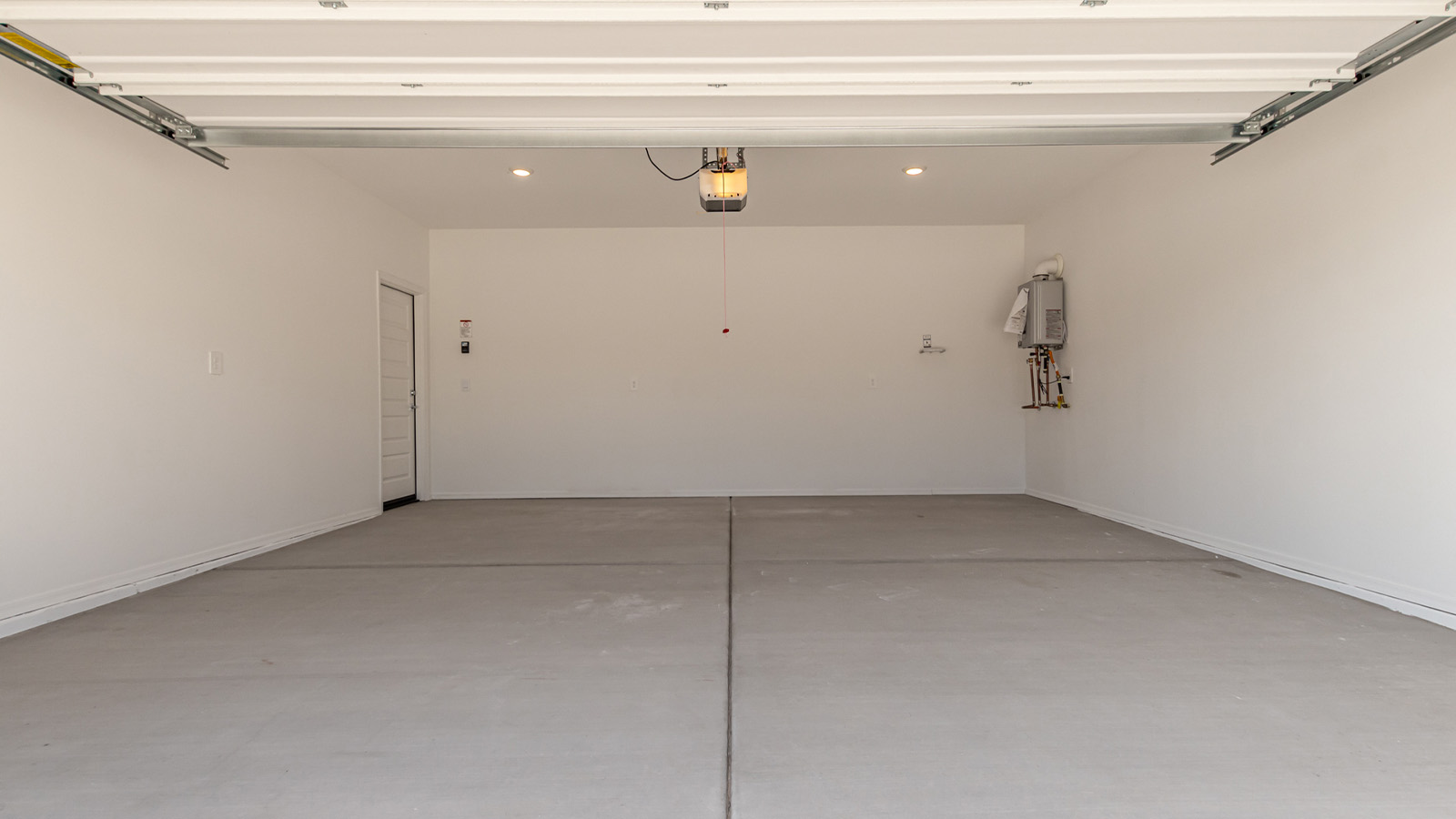 Introducing The Grace at Blackhawk in Tucson, Arizona – a spacious 1,963 sq. ft. two-story new home designed to accommodate modern living with style and functionality.  As you step through the welcoming front porch, you’re greeted by an open and inviting entryway that leads directly into the heart of the home. The main level features a spacious great room that flows seamlessly into the dining area and the modern kitchen, creating a perfect space for entertaining and family gatherings. The kitchen is equipped with elegant granite countertops, a large island with a breakfast bar, modern appliances, and a pantry that offers plenty of storage, making it as functional as it is stylish.  The main floor also includes a convenient powder room for guests, and direct access to the two-car garage, enhancing the home’s functionality and ease of living.  Heading upstairs, you'll discover the family’s private quarters. The master suite is a serene retreat, featuring a generously sized bedroom, a large walk-in closet, and an en-suite bathroom complete with dual vanities and a walk-in shower. The upper level also includes three additional bedrooms, a full bathroom, and a utility room conveniently located for easy access to all bedrooms. Additionally, a versatile loft area serves as a flexible space that can be used as a game room, home office, or even a second living area.  Back downstairs, step outside from the great room to the covered patio, where you can enjoy Tucson’s beautiful weather year-round. Whether you’re hosting an outdoor gathering or simply relaxing after a long day, this space extends your living area and enhances the home’s inviting ambiance.  Designed with energy efficiency in mind, The Grace at Blackhawk is a DOE Zero Energy Ready Home, ensuring sustainability, comfort, and long-term savings.