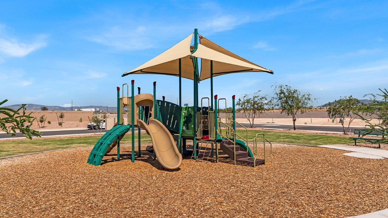 Introducing The Grace at Blackhawk in Tucson, Arizona – a spacious 1,963 sq. ft. two-story new home designed to accommodate modern living with style and functionality.  As you step through the welcoming front porch, you’re greeted by an open and inviting entryway that leads directly into the heart of the home. The main level features a spacious great room that flows seamlessly into the dining area and the modern kitchen, creating a perfect space for entertaining and family gatherings. The kitchen is equipped with elegant granite countertops, a large island with a breakfast bar, modern appliances, and a pantry that offers plenty of storage, making it as functional as it is stylish.  The main floor also includes a convenient powder room for guests, and direct access to the two-car garage, enhancing the home’s functionality and ease of living.  Heading upstairs, you'll discover the family’s private quarters. The master suite is a serene retreat, featuring a generously sized bedroom, a large walk-in closet, and an en-suite bathroom complete with dual vanities and a walk-in shower. The upper level also includes three additional bedrooms, a full bathroom, and a utility room conveniently located for easy access to all bedrooms. Additionally, a versatile loft area serves as a flexible space that can be used as a game room, home office, or even a second living area.  Back downstairs, step outside from the great room to the covered patio, where you can enjoy Tucson’s beautiful weather year-round. Whether you’re hosting an outdoor gathering or simply relaxing after a long day, this space extends your living area and enhances the home’s inviting ambiance.  Designed with energy efficiency in mind, The Grace at Blackhawk is a DOE Zero Energy Ready Home, ensuring sustainability, comfort, and long-term savings.