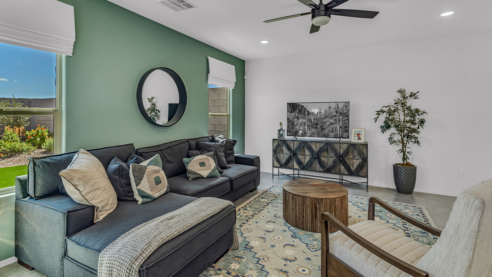 Introducing The Kate at Blackhawk in Tucson, Arizona – a spacious 2,264 sq. ft. two-story new home designed to offer both comfort and modern living in a prime location.  As you step through the inviting front porch, you’re welcomed into a thoughtfully designed entryway that leads directly into the heart of the home. The main floor boasts a generous great room that seamlessly connects to the dining area and kitchen, creating an ideal space for entertaining and everyday living. The kitchen is equipped with sleek granite countertops, a large island with a breakfast bar, modern appliances, and a pantry that provides ample storage, ensuring that the kitchen is both functional and stylish.  The main level also features a convenient powder room, perfect for guests, and direct access to the two-car garage, enhancing the home’s practicality.  Heading upstairs, you’ll discover the family’s private quarters. The master suite offers a serene retreat, complete with a spacious bedroom, a large walk-in closet, and an en-suite bathroom featuring dual vanities and a walk-in shower. The upper level also includes three additional bedrooms, a full bathroom, and a utility room centrally located for easy access. Additionally, a versatile loft area provides extra space that can be tailored to fit your lifestyle, whether as a game room, home office, or a second living area.  Step outside from the great room to the covered patio, where you can enjoy Tucson’s beautiful weather year-round. Whether you’re hosting an outdoor gathering or simply relaxing after a long day, this space extends your living area and enhances the home’s inviting ambiance.  Designed with energy efficiency in mind, The Kate at Blackhawk is a DOE Zero Energy Ready Home, combining sustainability, comfort, and long-term savings.