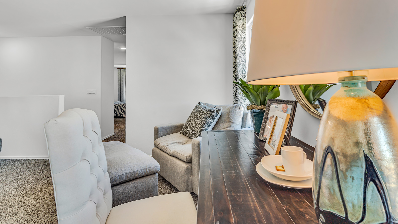 Introducing The Kate at Blackhawk in Tucson, Arizona – a spacious 2,264 sq. ft. two-story new home designed to offer both comfort and modern living in a prime location.  As you step through the inviting front porch, you’re welcomed into a thoughtfully designed entryway that leads directly into the heart of the home. The main floor boasts a generous great room that seamlessly connects to the dining area and kitchen, creating an ideal space for entertaining and everyday living. The kitchen is equipped with sleek granite countertops, a large island with a breakfast bar, modern appliances, and a pantry that provides ample storage, ensuring that the kitchen is both functional and stylish.  The main level also features a convenient powder room, perfect for guests, and direct access to the two-car garage, enhancing the home’s practicality.  Heading upstairs, you’ll discover the family’s private quarters. The master suite offers a serene retreat, complete with a spacious bedroom, a large walk-in closet, and an en-suite bathroom featuring dual vanities and a walk-in shower. The upper level also includes three additional bedrooms, a full bathroom, and a utility room centrally located for easy access. Additionally, a versatile loft area provides extra space that can be tailored to fit your lifestyle, whether as a game room, home office, or a second living area.  Step outside from the great room to the covered patio, where you can enjoy Tucson’s beautiful weather year-round. Whether you’re hosting an outdoor gathering or simply relaxing after a long day, this space extends your living area and enhances the home’s inviting ambiance.  Designed with energy efficiency in mind, The Kate at Blackhawk is a DOE Zero Energy Ready Home, combining sustainability, comfort, and long-term savings.