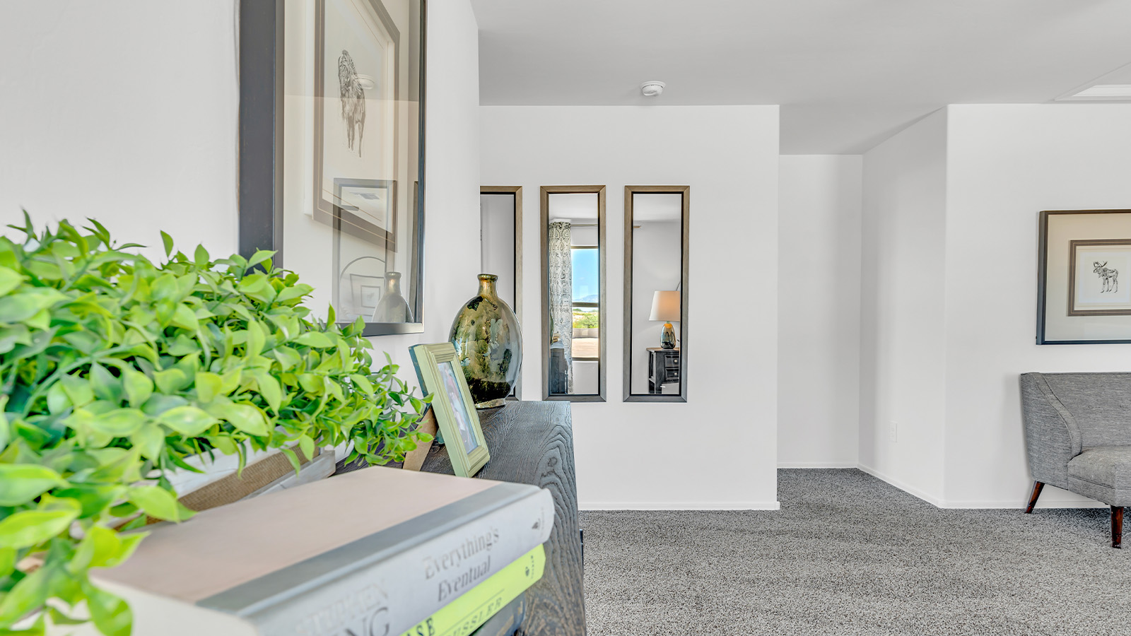 Introducing The Kate at Blackhawk in Tucson, Arizona – a spacious 2,264 sq. ft. two-story new home designed to offer both comfort and modern living in a prime location.  As you step through the inviting front porch, you’re welcomed into a thoughtfully designed entryway that leads directly into the heart of the home. The main floor boasts a generous great room that seamlessly connects to the dining area and kitchen, creating an ideal space for entertaining and everyday living. The kitchen is equipped with sleek granite countertops, a large island with a breakfast bar, modern appliances, and a pantry that provides ample storage, ensuring that the kitchen is both functional and stylish.  The main level also features a convenient powder room, perfect for guests, and direct access to the two-car garage, enhancing the home’s practicality.  Heading upstairs, you’ll discover the family’s private quarters. The master suite offers a serene retreat, complete with a spacious bedroom, a large walk-in closet, and an en-suite bathroom featuring dual vanities and a walk-in shower. The upper level also includes three additional bedrooms, a full bathroom, and a utility room centrally located for easy access. Additionally, a versatile loft area provides extra space that can be tailored to fit your lifestyle, whether as a game room, home office, or a second living area.  Step outside from the great room to the covered patio, where you can enjoy Tucson’s beautiful weather year-round. Whether you’re hosting an outdoor gathering or simply relaxing after a long day, this space extends your living area and enhances the home’s inviting ambiance.  Designed with energy efficiency in mind, The Kate at Blackhawk is a DOE Zero Energy Ready Home, combining sustainability, comfort, and long-term savings.