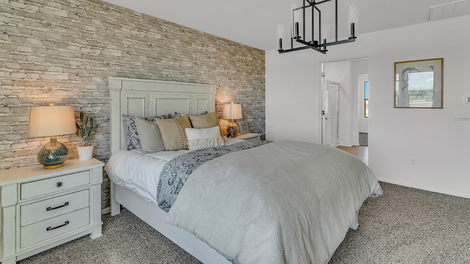 Introducing The Kate at Blackhawk in Tucson, Arizona – a spacious 2,264 sq. ft. two-story new home designed to offer both comfort and modern living in a prime location.  As you step through the inviting front porch, you’re welcomed into a thoughtfully designed entryway that leads directly into the heart of the home. The main floor boasts a generous great room that seamlessly connects to the dining area and kitchen, creating an ideal space for entertaining and everyday living. The kitchen is equipped with sleek granite countertops, a large island with a breakfast bar, modern appliances, and a pantry that provides ample storage, ensuring that the kitchen is both functional and stylish.  The main level also features a convenient powder room, perfect for guests, and direct access to the two-car garage, enhancing the home’s practicality.  Heading upstairs, you’ll discover the family’s private quarters. The master suite offers a serene retreat, complete with a spacious bedroom, a large walk-in closet, and an en-suite bathroom featuring dual vanities and a walk-in shower. The upper level also includes three additional bedrooms, a full bathroom, and a utility room centrally located for easy access. Additionally, a versatile loft area provides extra space that can be tailored to fit your lifestyle, whether as a game room, home office, or a second living area.  Step outside from the great room to the covered patio, where you can enjoy Tucson’s beautiful weather year-round. Whether you’re hosting an outdoor gathering or simply relaxing after a long day, this space extends your living area and enhances the home’s inviting ambiance.  Designed with energy efficiency in mind, The Kate at Blackhawk is a DOE Zero Energy Ready Home, combining sustainability, comfort, and long-term savings.