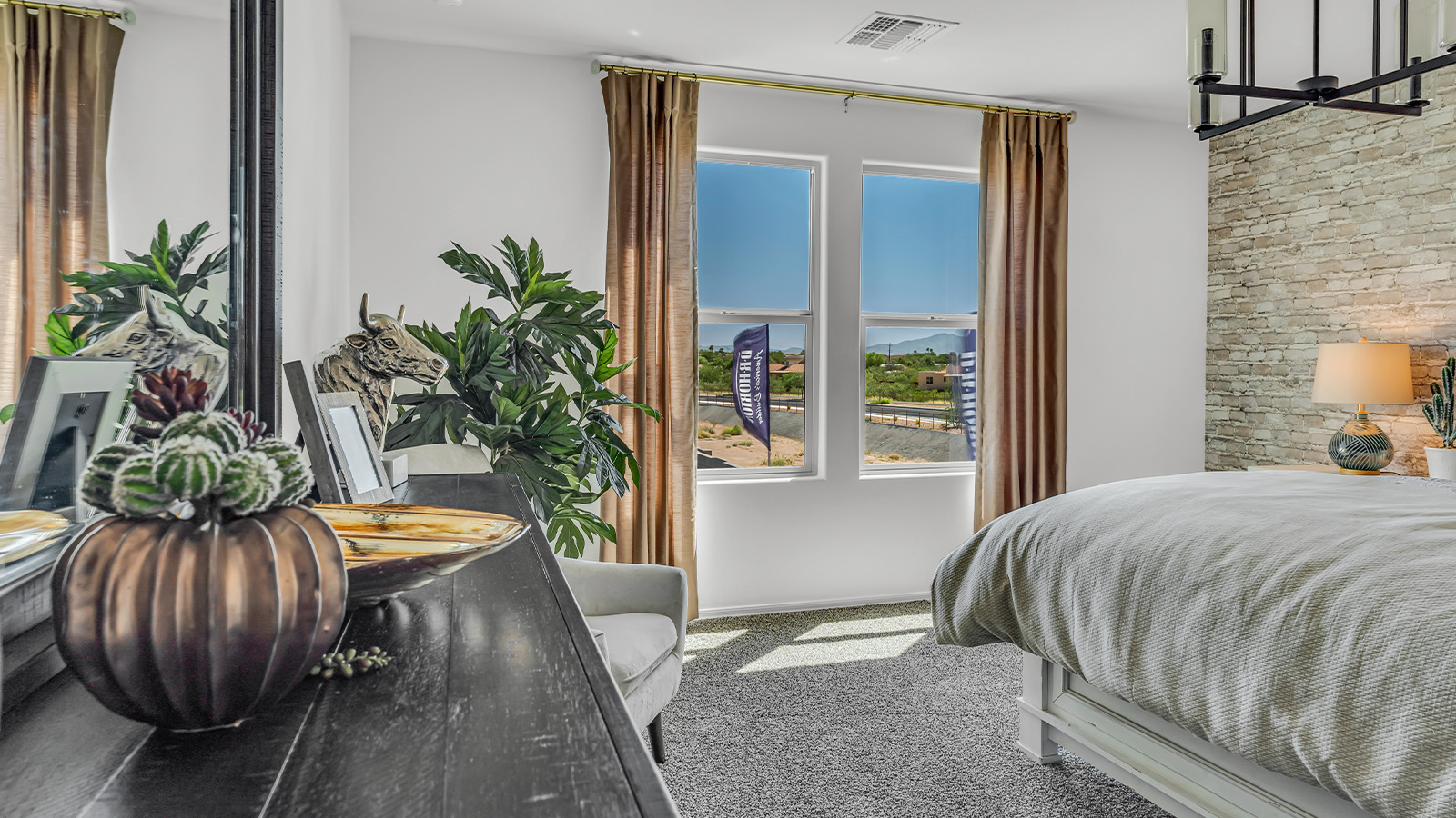 Introducing The Kate at Blackhawk in Tucson, Arizona – a spacious 2,264 sq. ft. two-story new home designed to offer both comfort and modern living in a prime location.  As you step through the inviting front porch, you’re welcomed into a thoughtfully designed entryway that leads directly into the heart of the home. The main floor boasts a generous great room that seamlessly connects to the dining area and kitchen, creating an ideal space for entertaining and everyday living. The kitchen is equipped with sleek granite countertops, a large island with a breakfast bar, modern appliances, and a pantry that provides ample storage, ensuring that the kitchen is both functional and stylish.  The main level also features a convenient powder room, perfect for guests, and direct access to the two-car garage, enhancing the home’s practicality.  Heading upstairs, you’ll discover the family’s private quarters. The master suite offers a serene retreat, complete with a spacious bedroom, a large walk-in closet, and an en-suite bathroom featuring dual vanities and a walk-in shower. The upper level also includes three additional bedrooms, a full bathroom, and a utility room centrally located for easy access. Additionally, a versatile loft area provides extra space that can be tailored to fit your lifestyle, whether as a game room, home office, or a second living area.  Step outside from the great room to the covered patio, where you can enjoy Tucson’s beautiful weather year-round. Whether you’re hosting an outdoor gathering or simply relaxing after a long day, this space extends your living area and enhances the home’s inviting ambiance.  Designed with energy efficiency in mind, The Kate at Blackhawk is a DOE Zero Energy Ready Home, combining sustainability, comfort, and long-term savings.