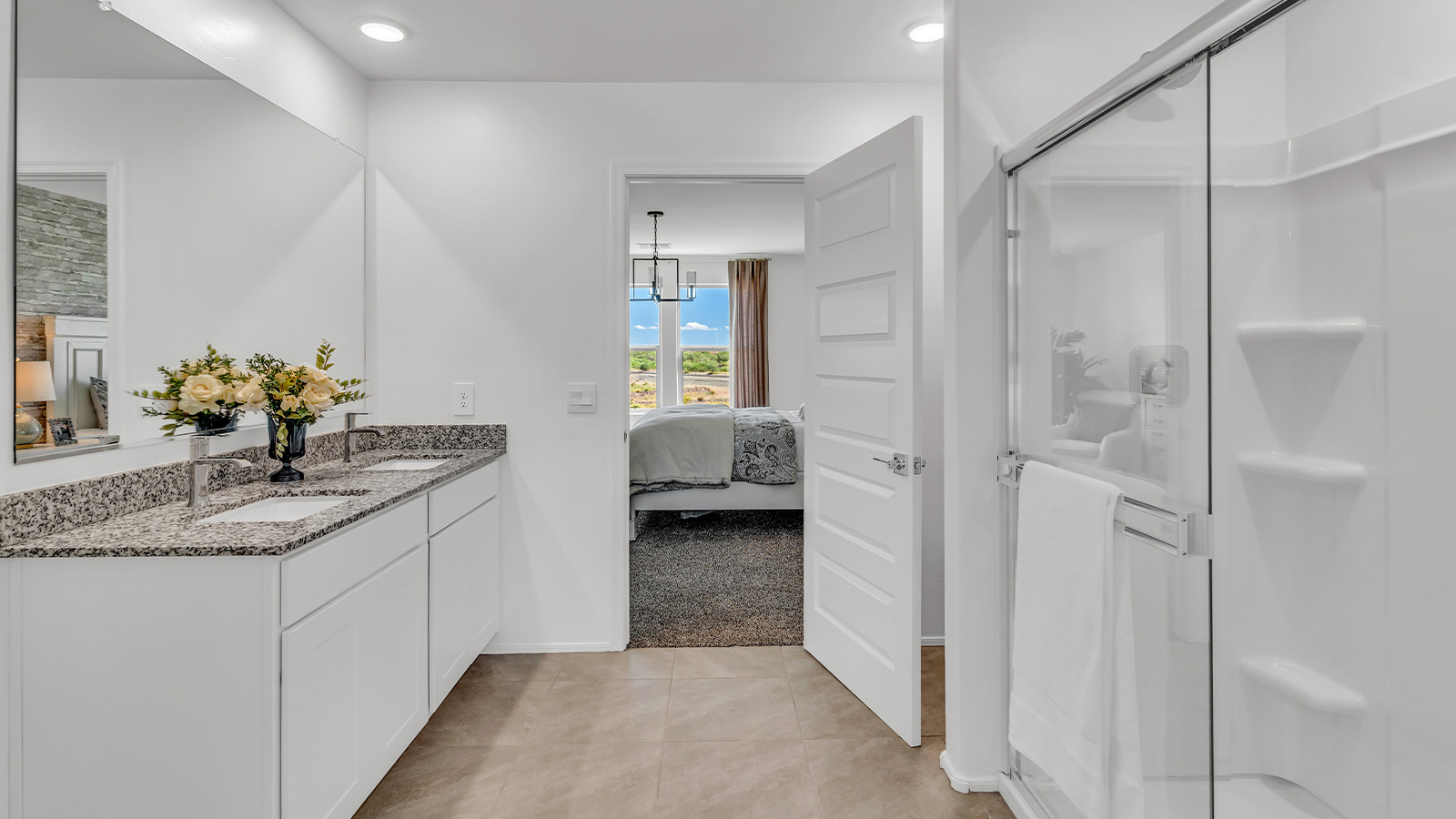 Introducing The Kate at Blackhawk in Tucson, Arizona – a spacious 2,264 sq. ft. two-story new home designed to offer both comfort and modern living in a prime location.  As you step through the inviting front porch, you’re welcomed into a thoughtfully designed entryway that leads directly into the heart of the home. The main floor boasts a generous great room that seamlessly connects to the dining area and kitchen, creating an ideal space for entertaining and everyday living. The kitchen is equipped with sleek granite countertops, a large island with a breakfast bar, modern appliances, and a pantry that provides ample storage, ensuring that the kitchen is both functional and stylish.  The main level also features a convenient powder room, perfect for guests, and direct access to the two-car garage, enhancing the home’s practicality.  Heading upstairs, you’ll discover the family’s private quarters. The master suite offers a serene retreat, complete with a spacious bedroom, a large walk-in closet, and an en-suite bathroom featuring dual vanities and a walk-in shower. The upper level also includes three additional bedrooms, a full bathroom, and a utility room centrally located for easy access. Additionally, a versatile loft area provides extra space that can be tailored to fit your lifestyle, whether as a game room, home office, or a second living area.  Step outside from the great room to the covered patio, where you can enjoy Tucson’s beautiful weather year-round. Whether you’re hosting an outdoor gathering or simply relaxing after a long day, this space extends your living area and enhances the home’s inviting ambiance.  Designed with energy efficiency in mind, The Kate at Blackhawk is a DOE Zero Energy Ready Home, combining sustainability, comfort, and long-term savings.