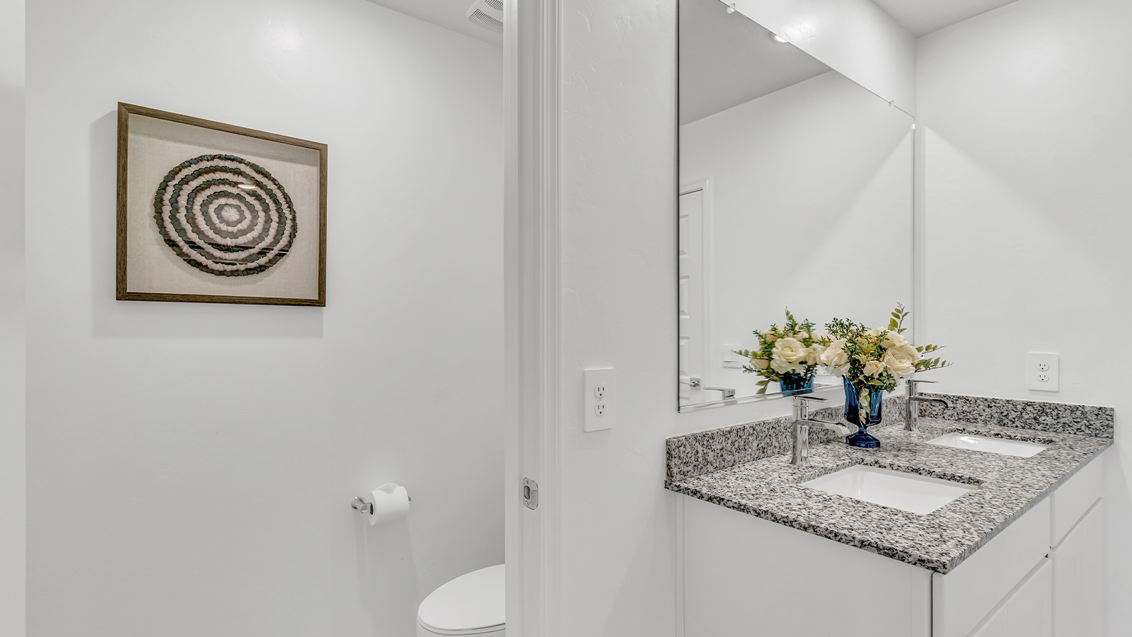 Introducing The Kate at Blackhawk in Tucson, Arizona – a spacious 2,264 sq. ft. two-story new home designed to offer both comfort and modern living in a prime location.  As you step through the inviting front porch, you’re welcomed into a thoughtfully designed entryway that leads directly into the heart of the home. The main floor boasts a generous great room that seamlessly connects to the dining area and kitchen, creating an ideal space for entertaining and everyday living. The kitchen is equipped with sleek granite countertops, a large island with a breakfast bar, modern appliances, and a pantry that provides ample storage, ensuring that the kitchen is both functional and stylish.  The main level also features a convenient powder room, perfect for guests, and direct access to the two-car garage, enhancing the home’s practicality.  Heading upstairs, you’ll discover the family’s private quarters. The master suite offers a serene retreat, complete with a spacious bedroom, a large walk-in closet, and an en-suite bathroom featuring dual vanities and a walk-in shower. The upper level also includes three additional bedrooms, a full bathroom, and a utility room centrally located for easy access. Additionally, a versatile loft area provides extra space that can be tailored to fit your lifestyle, whether as a game room, home office, or a second living area.  Step outside from the great room to the covered patio, where you can enjoy Tucson’s beautiful weather year-round. Whether you’re hosting an outdoor gathering or simply relaxing after a long day, this space extends your living area and enhances the home’s inviting ambiance.  Designed with energy efficiency in mind, The Kate at Blackhawk is a DOE Zero Energy Ready Home, combining sustainability, comfort, and long-term savings.