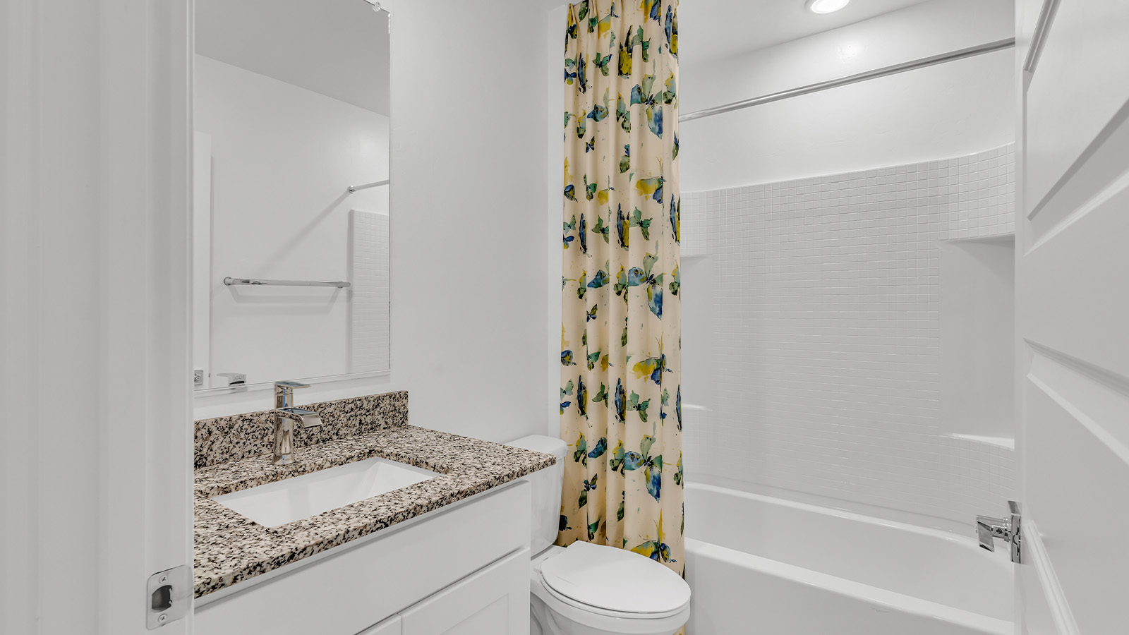 Introducing The Kate at Blackhawk in Tucson, Arizona – a spacious 2,264 sq. ft. two-story new home designed to offer both comfort and modern living in a prime location.  As you step through the inviting front porch, you’re welcomed into a thoughtfully designed entryway that leads directly into the heart of the home. The main floor boasts a generous great room that seamlessly connects to the dining area and kitchen, creating an ideal space for entertaining and everyday living. The kitchen is equipped with sleek granite countertops, a large island with a breakfast bar, modern appliances, and a pantry that provides ample storage, ensuring that the kitchen is both functional and stylish.  The main level also features a convenient powder room, perfect for guests, and direct access to the two-car garage, enhancing the home’s practicality.  Heading upstairs, you’ll discover the family’s private quarters. The master suite offers a serene retreat, complete with a spacious bedroom, a large walk-in closet, and an en-suite bathroom featuring dual vanities and a walk-in shower. The upper level also includes three additional bedrooms, a full bathroom, and a utility room centrally located for easy access. Additionally, a versatile loft area provides extra space that can be tailored to fit your lifestyle, whether as a game room, home office, or a second living area.  Step outside from the great room to the covered patio, where you can enjoy Tucson’s beautiful weather year-round. Whether you’re hosting an outdoor gathering or simply relaxing after a long day, this space extends your living area and enhances the home’s inviting ambiance.  Designed with energy efficiency in mind, The Kate at Blackhawk is a DOE Zero Energy Ready Home, combining sustainability, comfort, and long-term savings.