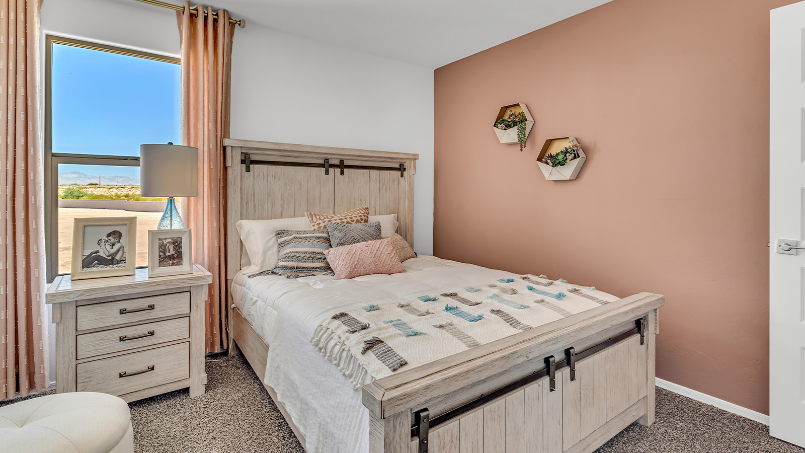 Introducing The Kate at Blackhawk in Tucson, Arizona – a spacious 2,264 sq. ft. two-story new home designed to offer both comfort and modern living in a prime location.  As you step through the inviting front porch, you’re welcomed into a thoughtfully designed entryway that leads directly into the heart of the home. The main floor boasts a generous great room that seamlessly connects to the dining area and kitchen, creating an ideal space for entertaining and everyday living. The kitchen is equipped with sleek granite countertops, a large island with a breakfast bar, modern appliances, and a pantry that provides ample storage, ensuring that the kitchen is both functional and stylish.  The main level also features a convenient powder room, perfect for guests, and direct access to the two-car garage, enhancing the home’s practicality.  Heading upstairs, you’ll discover the family’s private quarters. The master suite offers a serene retreat, complete with a spacious bedroom, a large walk-in closet, and an en-suite bathroom featuring dual vanities and a walk-in shower. The upper level also includes three additional bedrooms, a full bathroom, and a utility room centrally located for easy access. Additionally, a versatile loft area provides extra space that can be tailored to fit your lifestyle, whether as a game room, home office, or a second living area.  Step outside from the great room to the covered patio, where you can enjoy Tucson’s beautiful weather year-round. Whether you’re hosting an outdoor gathering or simply relaxing after a long day, this space extends your living area and enhances the home’s inviting ambiance.  Designed with energy efficiency in mind, The Kate at Blackhawk is a DOE Zero Energy Ready Home, combining sustainability, comfort, and long-term savings.