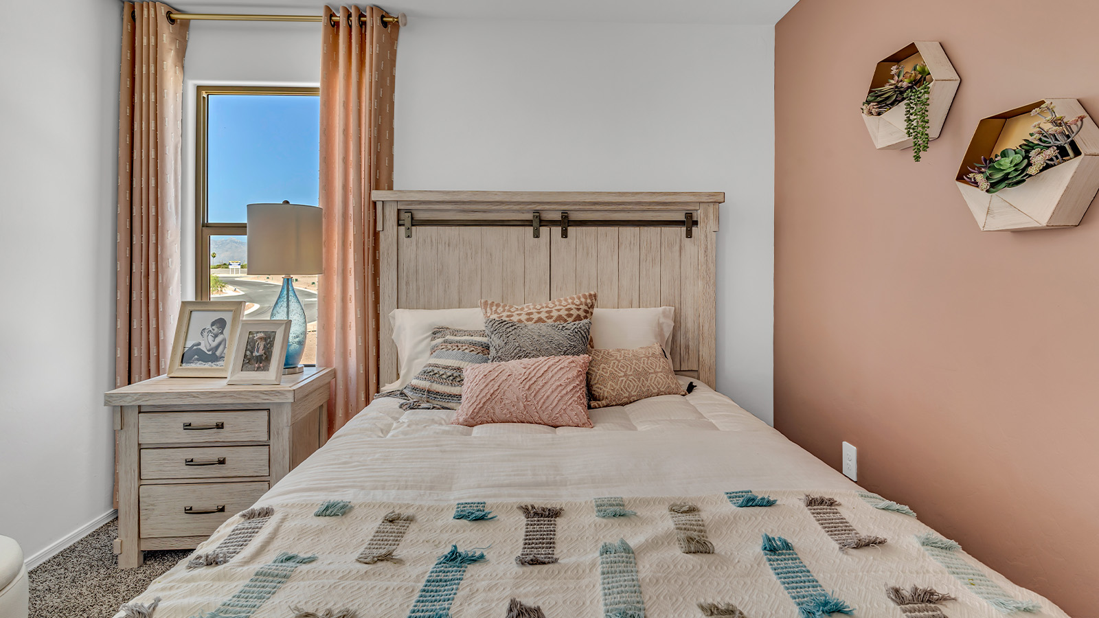 Introducing The Kate at Blackhawk in Tucson, Arizona – a spacious 2,264 sq. ft. two-story new home designed to offer both comfort and modern living in a prime location.  As you step through the inviting front porch, you’re welcomed into a thoughtfully designed entryway that leads directly into the heart of the home. The main floor boasts a generous great room that seamlessly connects to the dining area and kitchen, creating an ideal space for entertaining and everyday living. The kitchen is equipped with sleek granite countertops, a large island with a breakfast bar, modern appliances, and a pantry that provides ample storage, ensuring that the kitchen is both functional and stylish.  The main level also features a convenient powder room, perfect for guests, and direct access to the two-car garage, enhancing the home’s practicality.  Heading upstairs, you’ll discover the family’s private quarters. The master suite offers a serene retreat, complete with a spacious bedroom, a large walk-in closet, and an en-suite bathroom featuring dual vanities and a walk-in shower. The upper level also includes three additional bedrooms, a full bathroom, and a utility room centrally located for easy access. Additionally, a versatile loft area provides extra space that can be tailored to fit your lifestyle, whether as a game room, home office, or a second living area.  Step outside from the great room to the covered patio, where you can enjoy Tucson’s beautiful weather year-round. Whether you’re hosting an outdoor gathering or simply relaxing after a long day, this space extends your living area and enhances the home’s inviting ambiance.  Designed with energy efficiency in mind, The Kate at Blackhawk is a DOE Zero Energy Ready Home, combining sustainability, comfort, and long-term savings.