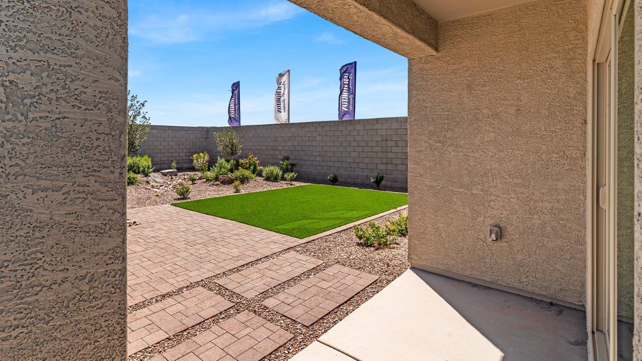 Introducing The Kate at Blackhawk in Tucson, Arizona – a spacious 2,264 sq. ft. two-story new home designed to offer both comfort and modern living in a prime location.  As you step through the inviting front porch, you’re welcomed into a thoughtfully designed entryway that leads directly into the heart of the home. The main floor boasts a generous great room that seamlessly connects to the dining area and kitchen, creating an ideal space for entertaining and everyday living. The kitchen is equipped with sleek granite countertops, a large island with a breakfast bar, modern appliances, and a pantry that provides ample storage, ensuring that the kitchen is both functional and stylish.  The main level also features a convenient powder room, perfect for guests, and direct access to the two-car garage, enhancing the home’s practicality.  Heading upstairs, you’ll discover the family’s private quarters. The master suite offers a serene retreat, complete with a spacious bedroom, a large walk-in closet, and an en-suite bathroom featuring dual vanities and a walk-in shower. The upper level also includes three additional bedrooms, a full bathroom, and a utility room centrally located for easy access. Additionally, a versatile loft area provides extra space that can be tailored to fit your lifestyle, whether as a game room, home office, or a second living area.  Step outside from the great room to the covered patio, where you can enjoy Tucson’s beautiful weather year-round. Whether you’re hosting an outdoor gathering or simply relaxing after a long day, this space extends your living area and enhances the home’s inviting ambiance.  Designed with energy efficiency in mind, The Kate at Blackhawk is a DOE Zero Energy Ready Home, combining sustainability, comfort, and long-term savings.