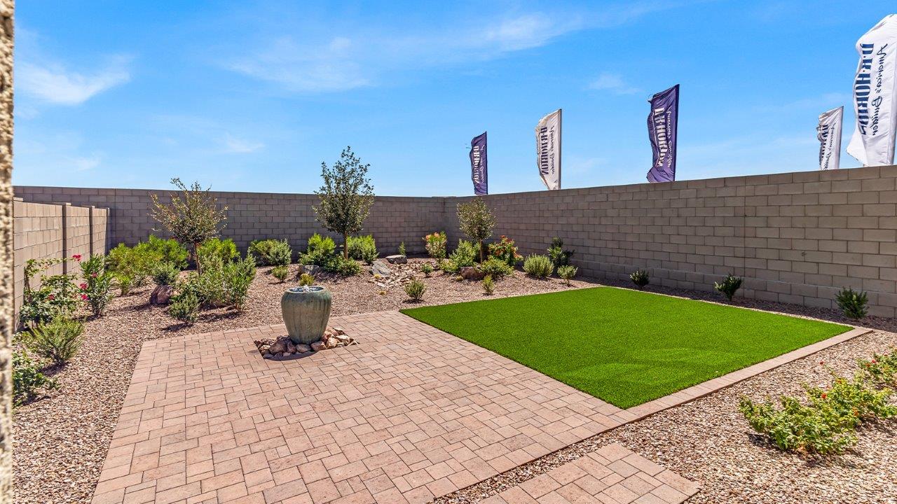 Introducing The Kate at Blackhawk in Tucson, Arizona – a spacious 2,264 sq. ft. two-story new home designed to offer both comfort and modern living in a prime location.  As you step through the inviting front porch, you’re welcomed into a thoughtfully designed entryway that leads directly into the heart of the home. The main floor boasts a generous great room that seamlessly connects to the dining area and kitchen, creating an ideal space for entertaining and everyday living. The kitchen is equipped with sleek granite countertops, a large island with a breakfast bar, modern appliances, and a pantry that provides ample storage, ensuring that the kitchen is both functional and stylish.  The main level also features a convenient powder room, perfect for guests, and direct access to the two-car garage, enhancing the home’s practicality.  Heading upstairs, you’ll discover the family’s private quarters. The master suite offers a serene retreat, complete with a spacious bedroom, a large walk-in closet, and an en-suite bathroom featuring dual vanities and a walk-in shower. The upper level also includes three additional bedrooms, a full bathroom, and a utility room centrally located for easy access. Additionally, a versatile loft area provides extra space that can be tailored to fit your lifestyle, whether as a game room, home office, or a second living area.  Step outside from the great room to the covered patio, where you can enjoy Tucson’s beautiful weather year-round. Whether you’re hosting an outdoor gathering or simply relaxing after a long day, this space extends your living area and enhances the home’s inviting ambiance.  Designed with energy efficiency in mind, The Kate at Blackhawk is a DOE Zero Energy Ready Home, combining sustainability, comfort, and long-term savings.