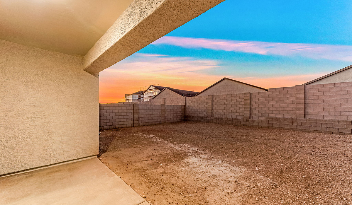 Welcome to The Madison at Blackhawk in Tucson, Arizona – the largest home in the community, offering an expansive 2,522 sq. ft. of living space designed for families seeking both luxury and functionality.  As you step through the inviting front porch, you're greeted by a thoughtfully designed entryway that leads into the heart of the home. The main level features a spacious great room that flows effortlessly into the dining area and the kitchen, making it an ideal space for entertaining and family gatherings. The kitchen is equipped with elegant granite countertops, a large island with a breakfast bar, modern appliances, and a pantry that provides ample storage, ensuring that the kitchen is as functional as it is stylish.  The main floor also includes a bedroom with easy access to a full bathroom, making it a perfect guest suite or a private home office. The convenient bathroom and direct access to the two-car garage enhance the home’s functionality, while the nearby utility room adds a layer of practicality to daily living.  Heading upstairs, you’ll find the family’s private quarters. The master suite is a true retreat, featuring a generously sized bedroom, a large walk-in closet, and an en-suite bathroom complete with dual vanities and a walk-in shower. The upper level also includes three additional bedrooms, a full bathroom, and a versatile loft area that can be tailored to fit your lifestyle, whether as a playroom, home office, or additional living space.  Back downstairs, step outside from the great room to the covered patio, where you can enjoy Tucson’s stunning weather year-round. Whether you’re hosting an outdoor gathering or simply relaxing after a long day, this space extends your living area and enhances the home’s inviting ambiance.  Designed with energy efficiency in mind, The Madison at Blackhawk is a DOE Zero Energy Ready Home, ensuring sustainability, comfort, and long-term savings.