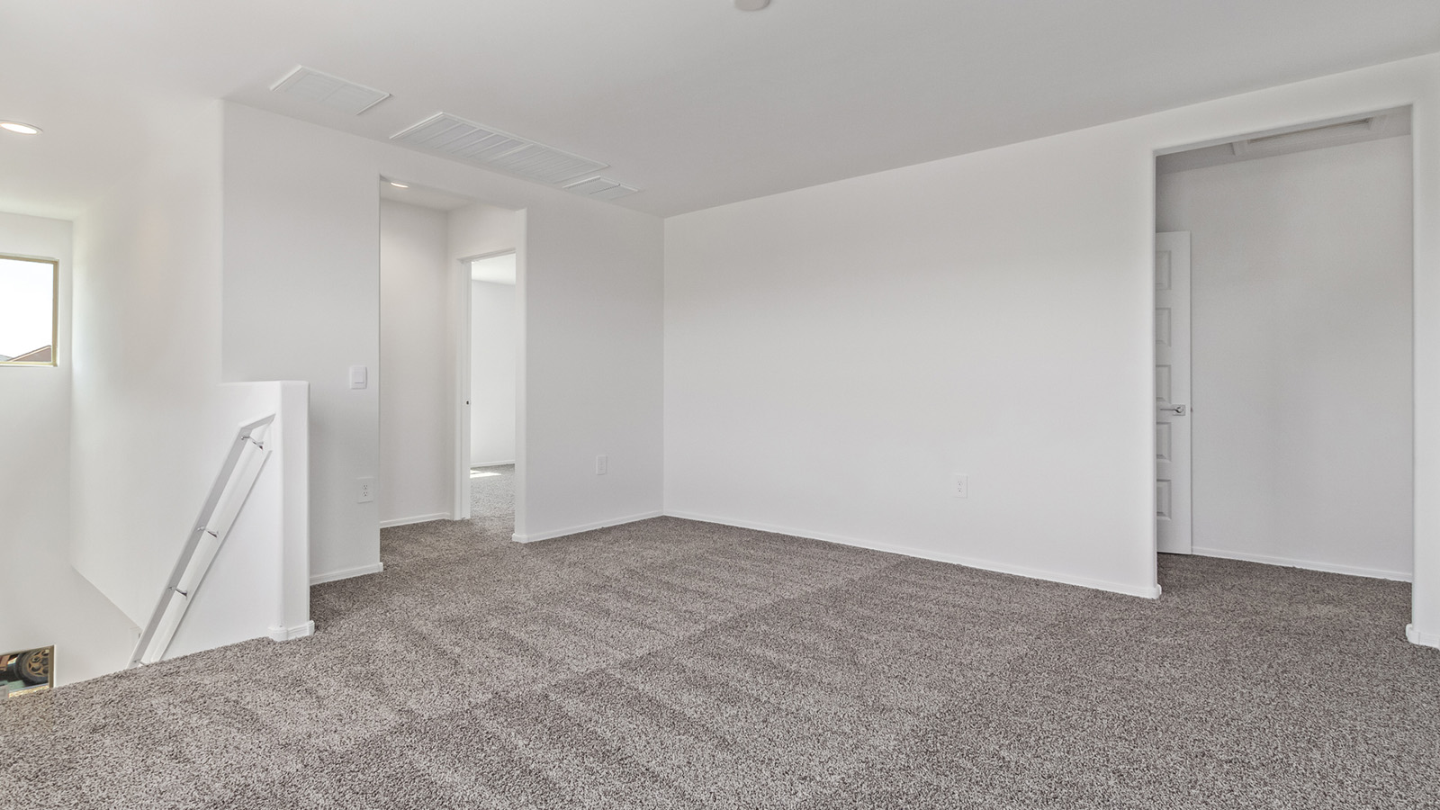 Welcome to The Madison at Blackhawk in Tucson, Arizona – the largest home in the community, offering an expansive 2,522 sq. ft. of living space designed for families seeking both luxury and functionality.  As you step through the inviting front porch, you're greeted by a thoughtfully designed entryway that leads into the heart of the home. The main level features a spacious great room that flows effortlessly into the dining area and the kitchen, making it an ideal space for entertaining and family gatherings. The kitchen is equipped with elegant granite countertops, a large island with a breakfast bar, modern appliances, and a pantry that provides ample storage, ensuring that the kitchen is as functional as it is stylish.  The main floor also includes a bedroom with easy access to a full bathroom, making it a perfect guest suite or a private home office. The convenient bathroom and direct access to the two-car garage enhance the home’s functionality, while the nearby utility room adds a layer of practicality to daily living.  Heading upstairs, you’ll find the family’s private quarters. The master suite is a true retreat, featuring a generously sized bedroom, a large walk-in closet, and an en-suite bathroom complete with dual vanities and a walk-in shower. The upper level also includes three additional bedrooms, a full bathroom, and a versatile loft area that can be tailored to fit your lifestyle, whether as a playroom, home office, or additional living space.  Back downstairs, step outside from the great room to the covered patio, where you can enjoy Tucson’s stunning weather year-round. Whether you’re hosting an outdoor gathering or simply relaxing after a long day, this space extends your living area and enhances the home’s inviting ambiance.  Designed with energy efficiency in mind, The Madison at Blackhawk is a DOE Zero Energy Ready Home, ensuring sustainability, comfort, and long-term savings.