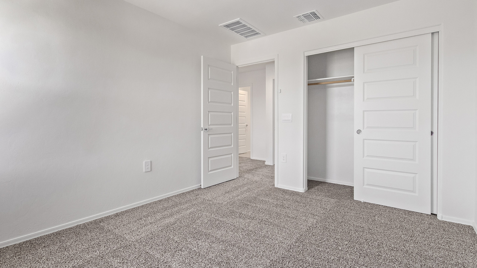 Welcome to The Madison at Blackhawk in Tucson, Arizona – the largest home in the community, offering an expansive 2,522 sq. ft. of living space designed for families seeking both luxury and functionality.  As you step through the inviting front porch, you're greeted by a thoughtfully designed entryway that leads into the heart of the home. The main level features a spacious great room that flows effortlessly into the dining area and the kitchen, making it an ideal space for entertaining and family gatherings. The kitchen is equipped with elegant granite countertops, a large island with a breakfast bar, modern appliances, and a pantry that provides ample storage, ensuring that the kitchen is as functional as it is stylish.  The main floor also includes a bedroom with easy access to a full bathroom, making it a perfect guest suite or a private home office. The convenient bathroom and direct access to the two-car garage enhance the home’s functionality, while the nearby utility room adds a layer of practicality to daily living.  Heading upstairs, you’ll find the family’s private quarters. The master suite is a true retreat, featuring a generously sized bedroom, a large walk-in closet, and an en-suite bathroom complete with dual vanities and a walk-in shower. The upper level also includes three additional bedrooms, a full bathroom, and a versatile loft area that can be tailored to fit your lifestyle, whether as a playroom, home office, or additional living space.  Back downstairs, step outside from the great room to the covered patio, where you can enjoy Tucson’s stunning weather year-round. Whether you’re hosting an outdoor gathering or simply relaxing after a long day, this space extends your living area and enhances the home’s inviting ambiance.  Designed with energy efficiency in mind, The Madison at Blackhawk is a DOE Zero Energy Ready Home, ensuring sustainability, comfort, and long-term savings.