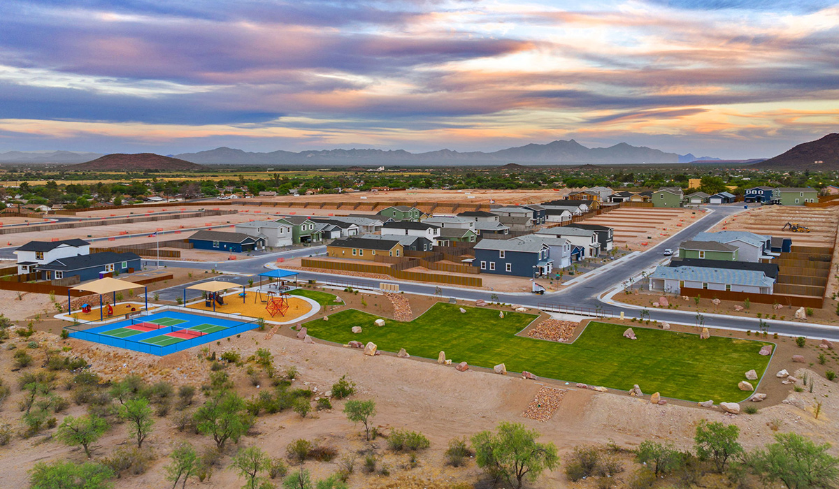 Introducing Redford Estates by D.R. Horton – Your Future Awaits in Southwest Tucson. Get ready for something spectacular! D.R. Horton is breaking ground on Redford Estates, our newest community on the booming southwest side of Tucson. Positioned along the key Valencia corridor just off I-19.  Spanning nearly 7 acres of planned recreation and park space, Redford Estates offers an unparalleled lifestyle. Imagine spending your weekends enjoying the expansive green areas, complete with walking paths and open spaces. And with Ebonee Marie Moody Park immediately to the south, your family will have access to baseball fields, basketball courts, playgrounds, ramadas, and more, right at your doorstep.  Our homes at Redford Estates are designed with the future in mind. Each home features a Spanish lace stucco exterior, landscaped front yards with auto drip irrigation, and large backyards that are fully fenced and ready for your personal touch. Covered front porches and back patios offer the perfect spots to unwind and enjoy Tucson's breathtaking sunsets. Inside, the Home is Connected® Smart Home package brings modern convenience to your fingertips with a smart thermostat, video doorbell, keyless entry, and a Wi-Fi-enabled garage door opener.  Redford Estates is not just a place to live—it's a gateway to everything that makes Tucson unique. For those with a passion for food, Tucson's designation as a UNESCO City of Gastronomy means you'll be surrounded by some of the best culinary experiences the city has to offer, from traditional Mexican cuisine to innovative dishes that honor local heritage.  Outdoor enthusiasts will love being close to Tucson Mountain Park and The Loop, the nation's top-rated bike path, offering miles of scenic beauty for biking, walking, and exploration. Plus, with quick access to major employers like the University of Arizona and Tucson International Airport, Redford Estates is perfectly positioned for both work and play.