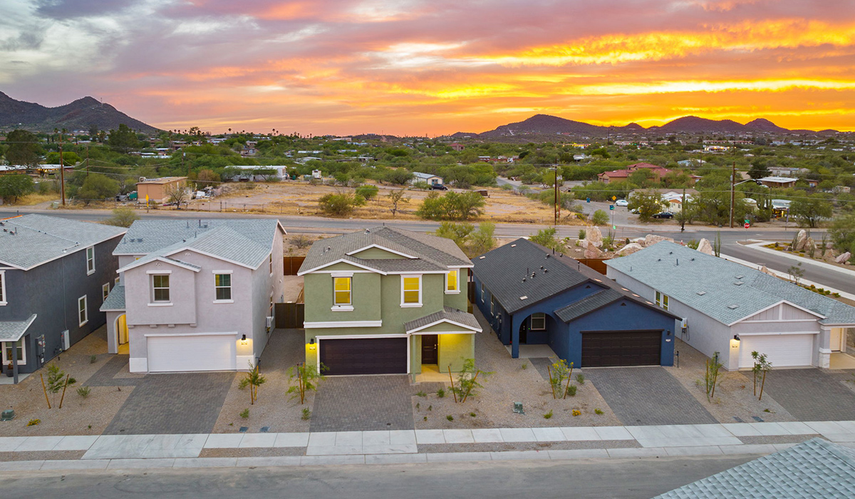Introducing the Elm floor plan, a thoughtfully designed two-story home now available in the brand-new Redford Estates community in Southwest Tucson, Arizona. With 1,775 square feet of modern living space, the Elm is perfect for those seeking a cozy yet highly functional home that offers a smart separation between the private second-floor retreat and the main living areas below.  Step through the inviting front porch into a welcoming entryway that opens into the main first floor, designed to maximize every inch of space. The expansive great room flows into the dining area and kitchen, creating an ideal layout for entertaining and everyday living. The kitchen features a central island, quartz countertops, Shaker-style cabinetry, and walk-in pantry. A conveniently located powder room completes the first floor. This home features a finished two-car garage accessible from the main floor.  Upstairs, the Elm offers four spacious bedrooms each with a generous closet. The primary suite provides a peaceful retreat with a walk-in closet and en-suite bathroom. The three additional bedrooms are situated just off the versatile loft area, ideal for an extra living space, game room, or home office. Everyday convenience is built in, with the laundry room and a full secondary bathroom also located on the second floor.  Our homes at Redford Estates are designed with the future in mind. Each home features a Spanish lace stucco exterior, landscaped front yards with auto drip irrigation, and large backyards that are fully fenced and ready for your personal touch. Inside, the Home is Connected® Smart Home package brings modern convenience to your fingertips with a smart thermostat, video doorbell, keyless entry, and a Wi-Fi-enabled garage door opener.  Redford Estates is not just a place to live—it's a gateway to everything that makes Tucson unique. The Elm at Redford Estates combines comfort, style, and forward-thinking design, creating the perfect place to call home.