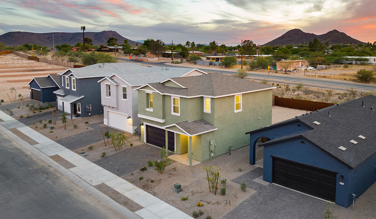 Introducing the Elm floor plan, a thoughtfully designed two-story home now available in the brand-new Redford Estates community in Southwest Tucson, Arizona. With 1,775 square feet of modern living space, the Elm is perfect for those seeking a cozy yet highly functional home that offers a smart separation between the private second-floor retreat and the main living areas below.  Step through the inviting front porch into a welcoming entryway that opens into the main first floor, designed to maximize every inch of space. The expansive great room flows into the dining area and kitchen, creating an ideal layout for entertaining and everyday living. The kitchen features a central island, quartz countertops, Shaker-style cabinetry, and walk-in pantry. A conveniently located powder room completes the first floor. This home features a finished two-car garage accessible from the main floor.  Upstairs, the Elm offers four spacious bedrooms each with a generous closet. The primary suite provides a peaceful retreat with a walk-in closet and en-suite bathroom. The three additional bedrooms are situated just off the versatile loft area, ideal for an extra living space, game room, or home office. Everyday convenience is built in, with the laundry room and a full secondary bathroom also located on the second floor.  Our homes at Redford Estates are designed with the future in mind. Each home features a Spanish lace stucco exterior, landscaped front yards with auto drip irrigation, and large backyards that are fully fenced and ready for your personal touch. Inside, the Home is Connected® Smart Home package brings modern convenience to your fingertips with a smart thermostat, video doorbell, keyless entry, and a Wi-Fi-enabled garage door opener.  Redford Estates is not just a place to live—it's a gateway to everything that makes Tucson unique. The Elm at Redford Estates combines comfort, style, and forward-thinking design, creating the perfect place to call home.