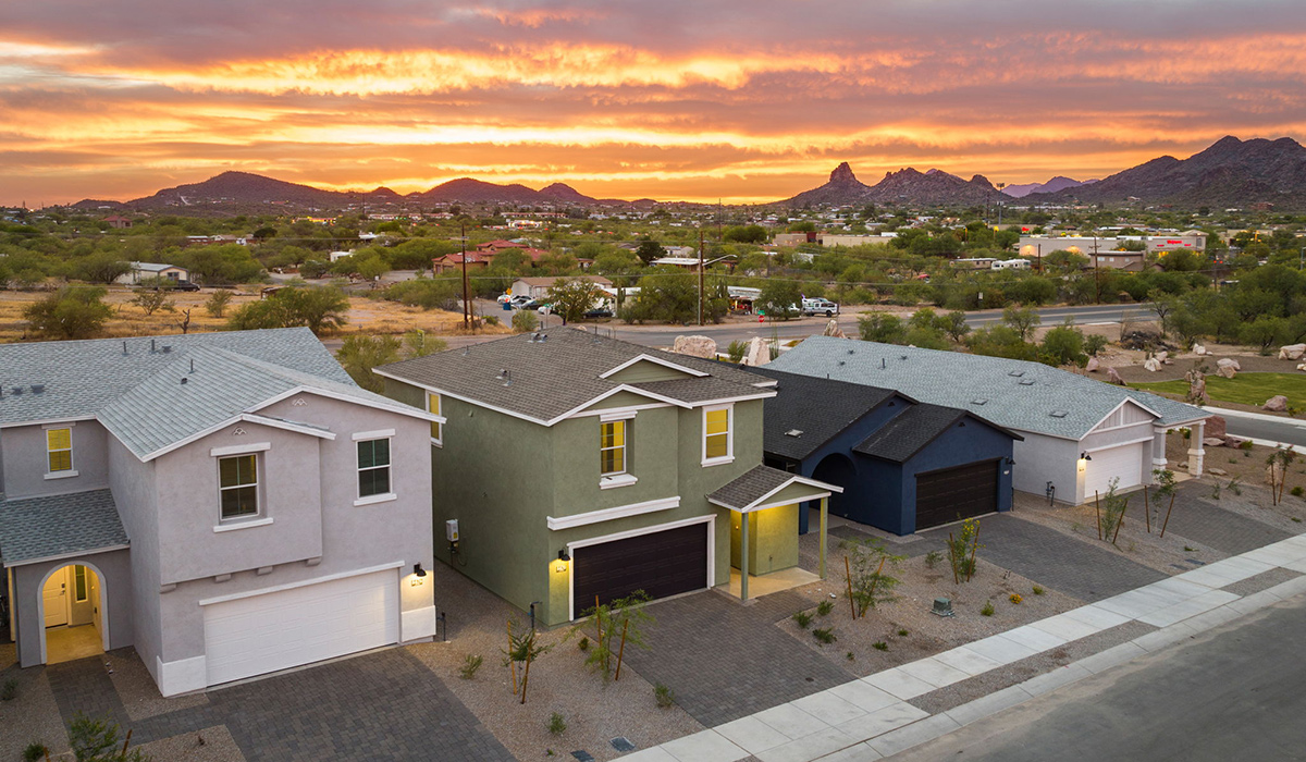 Introducing the Elm floor plan, a thoughtfully designed two-story home now available in the brand-new Redford Estates community in Southwest Tucson, Arizona. With 1,775 square feet of modern living space, the Elm is perfect for those seeking a cozy yet highly functional home that offers a smart separation between the private second-floor retreat and the main living areas below.  Step through the inviting front porch into a welcoming entryway that opens into the main first floor, designed to maximize every inch of space. The expansive great room flows into the dining area and kitchen, creating an ideal layout for entertaining and everyday living. The kitchen features a central island, quartz countertops, Shaker-style cabinetry, and walk-in pantry. A conveniently located powder room completes the first floor. This home features a finished two-car garage accessible from the main floor.  Upstairs, the Elm offers four spacious bedrooms each with a generous closet. The primary suite provides a peaceful retreat with a walk-in closet and en-suite bathroom. The three additional bedrooms are situated just off the versatile loft area, ideal for an extra living space, game room, or home office. Everyday convenience is built in, with the laundry room and a full secondary bathroom also located on the second floor.  Our homes at Redford Estates are designed with the future in mind. Each home features a Spanish lace stucco exterior, landscaped front yards with auto drip irrigation, and large backyards that are fully fenced and ready for your personal touch. Inside, the Home is Connected® Smart Home package brings modern convenience to your fingertips with a smart thermostat, video doorbell, keyless entry, and a Wi-Fi-enabled garage door opener.  Redford Estates is not just a place to live—it's a gateway to everything that makes Tucson unique. The Elm at Redford Estates combines comfort, style, and forward-thinking design, creating the perfect place to call home.