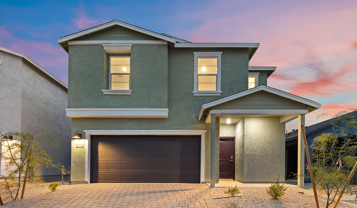 Introducing the Elm floor plan, a thoughtfully designed two-story home now available in the brand-new Redford Estates community in Southwest Tucson, Arizona. With 1,775 square feet of modern living space, the Elm is perfect for those seeking a cozy yet highly functional home that offers a smart separation between the private second-floor retreat and the main living areas below.  Step through the inviting front porch into a welcoming entryway that opens into the main first floor, designed to maximize every inch of space. The expansive great room flows into the dining area and kitchen, creating an ideal layout for entertaining and everyday living. The kitchen features a central island, quartz countertops, Shaker-style cabinetry, and walk-in pantry. A conveniently located powder room completes the first floor. This home features a finished two-car garage accessible from the main floor.  Upstairs, the Elm offers four spacious bedrooms each with a generous closet. The primary suite provides a peaceful retreat with a walk-in closet and en-suite bathroom. The three additional bedrooms are situated just off the versatile loft area, ideal for an extra living space, game room, or home office. Everyday convenience is built in, with the laundry room and a full secondary bathroom also located on the second floor.  Our homes at Redford Estates are designed with the future in mind. Each home features a Spanish lace stucco exterior, landscaped front yards with auto drip irrigation, and large backyards that are fully fenced and ready for your personal touch. Inside, the Home is Connected® Smart Home package brings modern convenience to your fingertips with a smart thermostat, video doorbell, keyless entry, and a Wi-Fi-enabled garage door opener.  Redford Estates is not just a place to live—it's a gateway to everything that makes Tucson unique. The Elm at Redford Estates combines comfort, style, and forward-thinking design, creating the perfect place to call home.