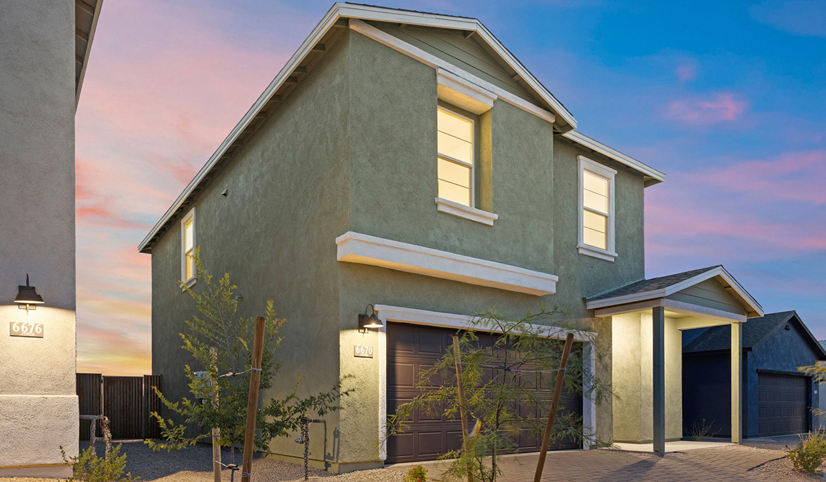 Introducing the Elm floor plan, a thoughtfully designed two-story home now available in the brand-new Redford Estates community in Southwest Tucson, Arizona. With 1,775 square feet of modern living space, the Elm is perfect for those seeking a cozy yet highly functional home that offers a smart separation between the private second-floor retreat and the main living areas below.  Step through the inviting front porch into a welcoming entryway that opens into the main first floor, designed to maximize every inch of space. The expansive great room flows into the dining area and kitchen, creating an ideal layout for entertaining and everyday living. The kitchen features a central island, quartz countertops, Shaker-style cabinetry, and walk-in pantry. A conveniently located powder room completes the first floor. This home features a finished two-car garage accessible from the main floor.  Upstairs, the Elm offers four spacious bedrooms each with a generous closet. The primary suite provides a peaceful retreat with a walk-in closet and en-suite bathroom. The three additional bedrooms are situated just off the versatile loft area, ideal for an extra living space, game room, or home office. Everyday convenience is built in, with the laundry room and a full secondary bathroom also located on the second floor.  Our homes at Redford Estates are designed with the future in mind. Each home features a Spanish lace stucco exterior, landscaped front yards with auto drip irrigation, and large backyards that are fully fenced and ready for your personal touch. Inside, the Home is Connected® Smart Home package brings modern convenience to your fingertips with a smart thermostat, video doorbell, keyless entry, and a Wi-Fi-enabled garage door opener.  Redford Estates is not just a place to live—it's a gateway to everything that makes Tucson unique. The Elm at Redford Estates combines comfort, style, and forward-thinking design, creating the perfect place to call home.