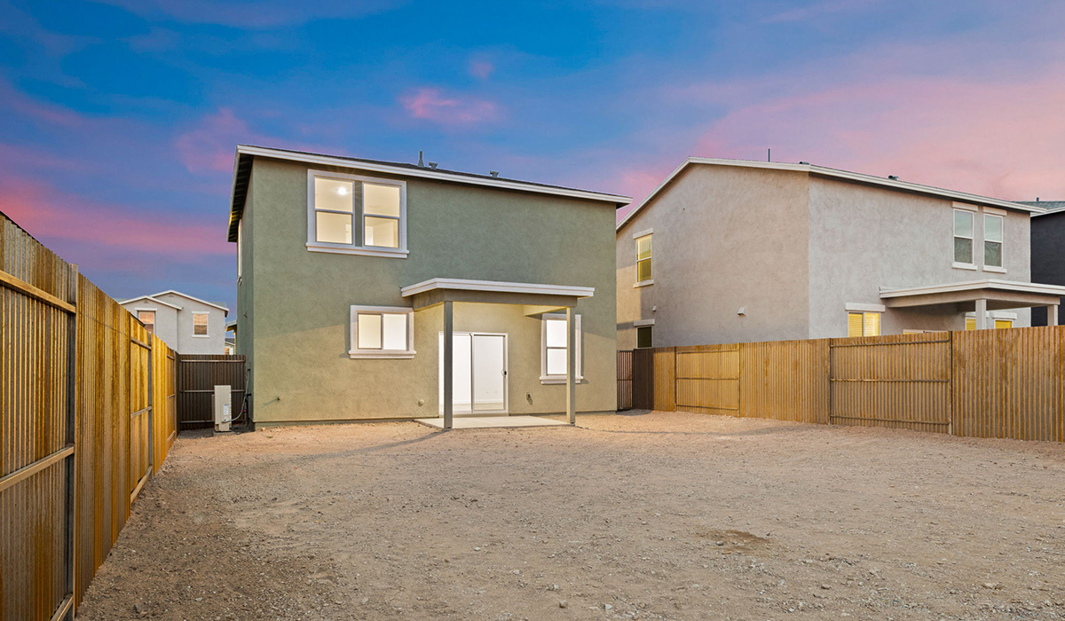 Introducing the Elm floor plan, a thoughtfully designed two-story home now available in the brand-new Redford Estates community in Southwest Tucson, Arizona. With 1,775 square feet of modern living space, the Elm is perfect for those seeking a cozy yet highly functional home that offers a smart separation between the private second-floor retreat and the main living areas below.  Step through the inviting front porch into a welcoming entryway that opens into the main first floor, designed to maximize every inch of space. The expansive great room flows into the dining area and kitchen, creating an ideal layout for entertaining and everyday living. The kitchen features a central island, quartz countertops, Shaker-style cabinetry, and walk-in pantry. A conveniently located powder room completes the first floor. This home features a finished two-car garage accessible from the main floor.  Upstairs, the Elm offers four spacious bedrooms each with a generous closet. The primary suite provides a peaceful retreat with a walk-in closet and en-suite bathroom. The three additional bedrooms are situated just off the versatile loft area, ideal for an extra living space, game room, or home office. Everyday convenience is built in, with the laundry room and a full secondary bathroom also located on the second floor.  Our homes at Redford Estates are designed with the future in mind. Each home features a Spanish lace stucco exterior, landscaped front yards with auto drip irrigation, and large backyards that are fully fenced and ready for your personal touch. Inside, the Home is Connected® Smart Home package brings modern convenience to your fingertips with a smart thermostat, video doorbell, keyless entry, and a Wi-Fi-enabled garage door opener.  Redford Estates is not just a place to live—it's a gateway to everything that makes Tucson unique. The Elm at Redford Estates combines comfort, style, and forward-thinking design--creating the perfect place to call home.