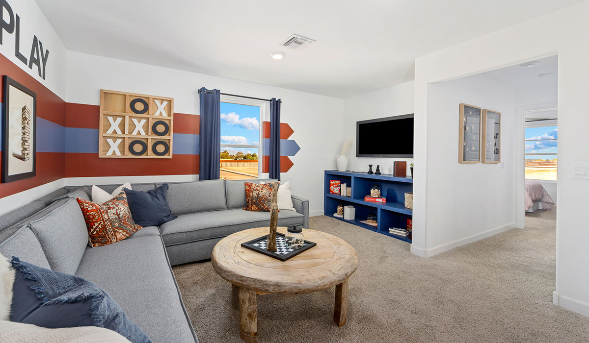 Discover the Gila — a versatile two-story floor plan offering 2,057 sq. ft. of comfortable, modern living in our new Redford Estate community of Southwest Tucson, Arizona.  Thoughtfully crafted for households of all sizes, the Gila features four bedrooms, a spacious loft, and three full bathrooms, ensuring every family member has their own space to unwind and recharge.  A standout highlight of this home is the guest-style suite on the main floor, offering convenient access to a full bathroom. Perfect for visitors, multigenerational living, or private home office, this main-level bedroom offers exceptional flexibility.  The main floor creates an inviting flow, with a generous great room that connects seamlessly to the dining area and kitchen. The kitchen features a large center island, Shaker-style cabinetry, and ample storage space to include a large pantry.  Upstairs, the Gila continues to impress with thoughtful design and family-friendly layout. The well-appointed primary bedroom includes a private en-suite bathroom and large walk-in closet. Bedrooms 2 and 3, along with the loft, share a full bathroom conveniently located for easy access. An additional standout feature is Bedroom 2, which includes a large walk-in closet—a perfect setup for teens, young adults, or anyone who appreciates extra storage and personal space. The second floor also features a large laundry room, conveniently located near the bedrooms.  Our homes at Redford Estates are designed with the future in mind. Each home features a Spanish lace stucco exterior, landscaped front yards with auto drip irrigation, and large backyards that are fully fenced and ready for your personal touch. Inside, the Home is Connected® Smart Home package brings modern convenience to your fingertips with a smart thermostat, video doorbell, keyless entry, and a Wi-Fi-enabled garage door opener.  With three full bathrooms, smartly arranged bedrooms, and spaces crafted for comfort and flexibility, the Gila is designed to meet the needs of today's busy and evolving lifestyles.