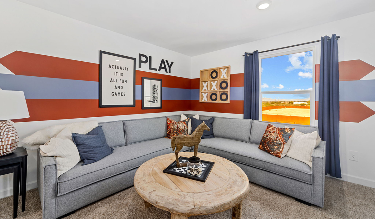 Discover the Gila — a versatile two-story floor plan offering 2,057 sq. ft. of comfortable, modern living in our new Redford Estate community of Southwest Tucson, Arizona.  Thoughtfully crafted for households of all sizes, the Gila features four bedrooms, a spacious loft, and three full bathrooms, ensuring every family member has their own space to unwind and recharge.  A standout highlight of this home is the guest-style suite on the main floor, offering convenient access to a full bathroom. Perfect for visitors, multigenerational living, or private home office, this main-level bedroom offers exceptional flexibility.  The main floor creates an inviting flow, with a generous great room that connects seamlessly to the dining area and kitchen. The kitchen features a large center island, Shaker-style cabinetry, and ample storage space to include a large pantry.  Upstairs, the Gila continues to impress with thoughtful design and family-friendly layout. The well-appointed primary bedroom includes a private en-suite bathroom and large walk-in closet. Bedrooms 2 and 3, along with the loft, share a full bathroom conveniently located for easy access. An additional standout feature is Bedroom 2, which includes a large walk-in closet—a perfect setup for teens, young adults, or anyone who appreciates extra storage and personal space. The second floor also features a large laundry room, conveniently located near the bedrooms.  Our homes at Redford Estates are designed with the future in mind. Each home features a Spanish lace stucco exterior, landscaped front yards with auto drip irrigation, and large backyards that are fully fenced and ready for your personal touch. Inside, the Home is Connected® Smart Home package brings modern convenience to your fingertips with a smart thermostat, video doorbell, keyless entry, and a Wi-Fi-enabled garage door opener.  With three full bathrooms, smartly arranged bedrooms, and spaces crafted for comfort and flexibility, the Gila is designed to meet the needs of today's busy and evolving lifestyles.