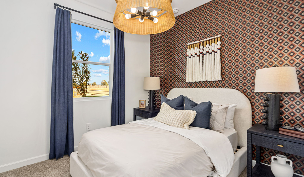 Discover the Gila — a versatile two-story floor plan offering 2,057 sq. ft. of comfortable, modern living in our new Redford Estate community of Southwest Tucson, Arizona.  Thoughtfully crafted for households of all sizes, the Gila features four bedrooms, a spacious loft, and three full bathrooms, ensuring every family member has their own space to unwind and recharge.  A standout highlight of this home is the guest-style suite on the main floor, offering convenient access to a full bathroom. Perfect for visitors, multigenerational living, or private home office, this main-level bedroom offers exceptional flexibility.  The main floor creates an inviting flow, with a generous great room that connects seamlessly to the dining area and kitchen. The kitchen features a large center island, Shaker-style cabinetry, and ample storage space to include a large pantry.  Upstairs, the Gila continues to impress with thoughtful design and family-friendly layout. The well-appointed primary bedroom includes a private en-suite bathroom and large walk-in closet. Bedrooms 2 and 3, along with the loft, share a full bathroom conveniently located for easy access. An additional standout feature is Bedroom 2, which includes a large walk-in closet—a perfect setup for teens, young adults, or anyone who appreciates extra storage and personal space. The second floor also features a large laundry room, conveniently located near the bedrooms.  Our homes at Redford Estates are designed with the future in mind. Each home features a Spanish lace stucco exterior, landscaped front yards with auto drip irrigation, and large backyards that are fully fenced and ready for your personal touch. Inside, the Home is Connected® Smart Home package brings modern convenience to your fingertips with a smart thermostat, video doorbell, keyless entry, and a Wi-Fi-enabled garage door opener.  With three full bathrooms, smartly arranged bedrooms, and spaces crafted for comfort and flexibility, the Gila is designed to meet the needs of today's busy and evolving lifestyles.