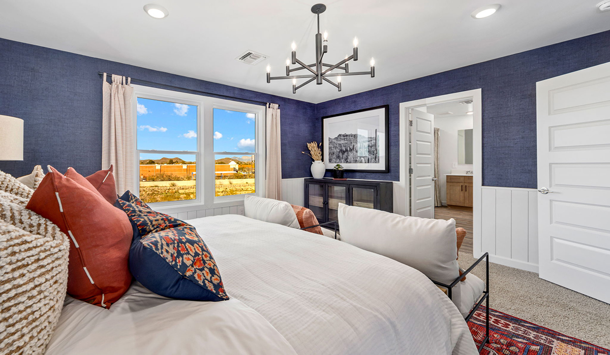 Discover the Gila — a versatile two-story floor plan offering 2,057 sq. ft. of comfortable, modern living in our new Redford Estate community of Southwest Tucson, Arizona.  Thoughtfully crafted for households of all sizes, the Gila features four bedrooms, a spacious loft, and three full bathrooms, ensuring every family member has their own space to unwind and recharge.  A standout highlight of this home is the guest-style suite on the main floor, offering convenient access to a full bathroom. Perfect for visitors, multigenerational living, or private home office, this main-level bedroom offers exceptional flexibility.  The main floor creates an inviting flow, with a generous great room that connects seamlessly to the dining area and kitchen. The kitchen features a large center island, Shaker-style cabinetry, and ample storage space to include a large pantry.  Upstairs, the Gila continues to impress with thoughtful design and family-friendly layout. The well-appointed primary bedroom includes a private en-suite bathroom and large walk-in closet. Bedrooms 2 and 3, along with the loft, share a full bathroom conveniently located for easy access. An additional standout feature is Bedroom 2, which includes a large walk-in closet—a perfect setup for teens, young adults, or anyone who appreciates extra storage and personal space. The second floor also features a large laundry room, conveniently located near the bedrooms.  Our homes at Redford Estates are designed with the future in mind. Each home features a Spanish lace stucco exterior, landscaped front yards with auto drip irrigation, and large backyards that are fully fenced and ready for your personal touch. Inside, the Home is Connected® Smart Home package brings modern convenience to your fingertips with a smart thermostat, video doorbell, keyless entry, and a Wi-Fi-enabled garage door opener.  With three full bathrooms, smartly arranged bedrooms, and spaces crafted for comfort and flexibility, the Gila is designed to meet the needs of today's busy and evolving lifestyles.