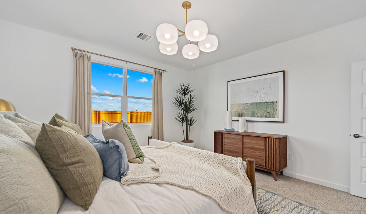 Introducing the Carolina — a thoughtfully designed single-story home offering 1,536 sq. ft. of modern comfort at Redford Estates in Southwest Tucson, Arizona.  With three bedrooms, two full bathrooms, and a two-car garage, this efficient and beautifully planned layout is perfect for those seeking convenience, comfort, and single-level living.  A welcoming front porch invites you inside, where the entryway opens into a bright and beautifully crafted living space. The heart of the home is the well-appointed kitchen, featuring a large center island, walk-in pantry, and stylish Shaker-style cabinetry.  Overlooking the dining area and great room, this open layout makes it easy to cook, gather, and entertain with ease.  The primary bedroom is thoughtfully positioned at the rear of the home, creating a private retreat. Complete with a large en-suite bathroom and walk-in closet, it's designed for relaxation and convenience.  Two additional bedrooms are located toward the front of the home, offering flexibility for family, guests, a home office, or hobbies, and share a full secondary hallway bathroom.  Our homes at Redford Estates are designed with the future in mind. Each home features a Spanish lace stucco exterior, landscaped front yards with auto drip irrigation, and large backyards that are fully fenced and ready for your personal touch. Inside, the Home is Connected® Smart Home package brings modern convenience to your fingertips with a smart thermostat, video doorbell, keyless entry, and a Wi-Fi-enabled garage door opener.  With its smart layout, modern features, and effortless single-story living, the Carolina brings comfort and functionality together in a one beautifully designed home here at Redford Estates.  *Images shown are for reference only. They depict the Carolina model home and may not represent the actual home.