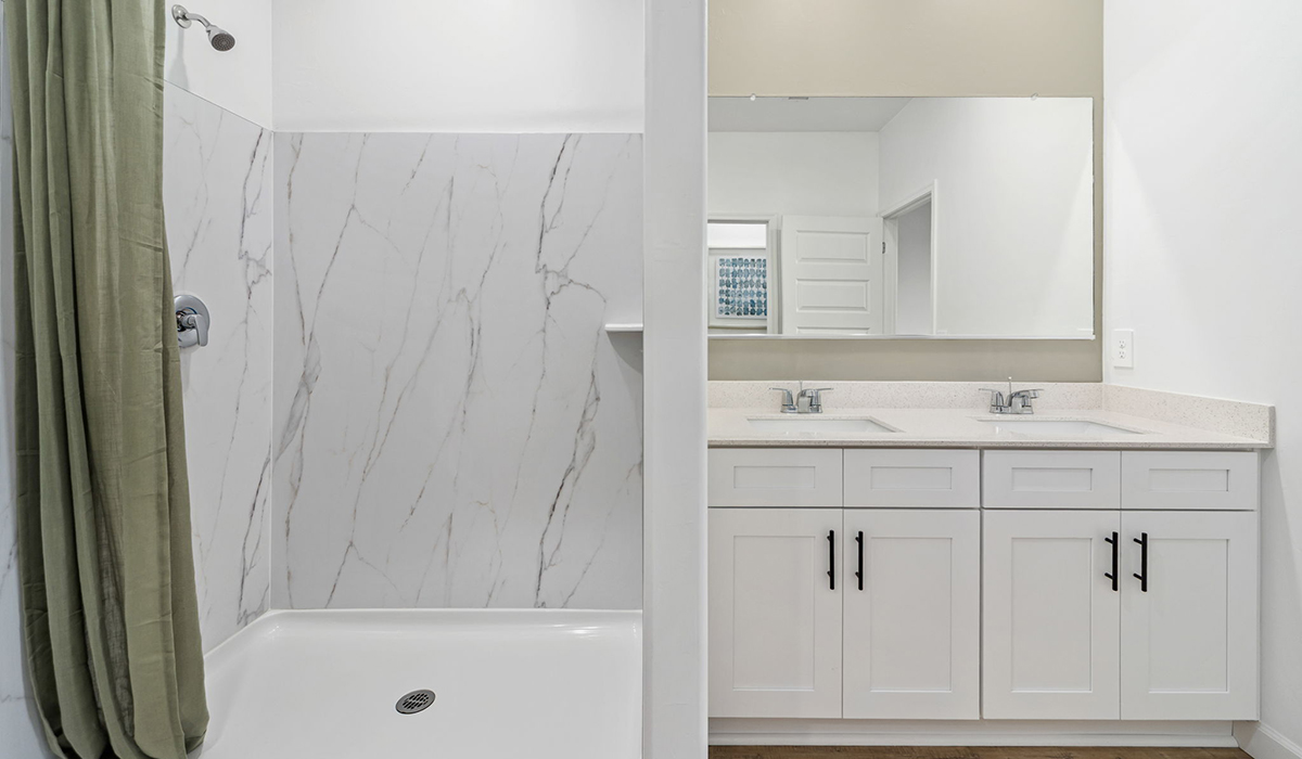 Introducing the Carolina — a thoughtfully designed single-story home offering 1,536 sq. ft. of modern comfort at Redford Estates in Southwest Tucson, Arizona.  With three bedrooms, two full bathrooms, and a two-car garage, this efficient and beautifully planned layout is perfect for those seeking convenience, comfort, and single-level living.  A welcoming front porch invites you inside, where the entryway opens into a bright and beautifully crafted living space. The heart of the home is the well-appointed kitchen, featuring a large center island, walk-in pantry, and stylish Shaker-style cabinetry.  Overlooking the dining area and great room, this open layout makes it easy to cook, gather, and entertain with ease.  The primary bedroom is thoughtfully positioned at the rear of the home, creating a private retreat. Complete with a large en-suite bathroom and walk-in closet, it's designed for relaxation and convenience.  Two additional bedrooms are located toward the front of the home, offering flexibility for family, guests, a home office, or hobbies, and share a full secondary hallway bathroom.  Our homes at Redford Estates are designed with the future in mind. Each home features a Spanish lace stucco exterior, landscaped front yards with auto drip irrigation, and large backyards that are fully fenced and ready for your personal touch. Inside, the Home is Connected® Smart Home package brings modern convenience to your fingertips with a smart thermostat, video doorbell, keyless entry, and a Wi-Fi-enabled garage door opener.  With its smart layout, modern features, and effortless single-story living, the Carolina brings comfort and functionality together in a one beautifully designed home here at Redford Estates.  *Images shown are for reference only. They depict the Carolina model home and may not represent the actual home.