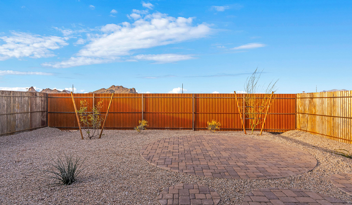 Introducing the Carolina — a thoughtfully designed single-story home offering 1,536 sq. ft. of modern comfort at Redford Estates in Southwest Tucson, Arizona.  With three bedrooms, two full bathrooms, and a two-car garage, this efficient and beautifully planned layout is perfect for those seeking convenience, comfort, and single-level living.  A welcoming front porch invites you inside, where the entryway opens into a bright and beautifully crafted living space. The heart of the home is the well-appointed kitchen, featuring a large center island, walk-in pantry, and stylish Shaker-style cabinetry.  Overlooking the dining area and great room, this open layout makes it easy to cook, gather, and entertain with ease.  The primary bedroom is thoughtfully positioned at the rear of the home, creating a private retreat. Complete with a large en-suite bathroom and walk-in closet, it's designed for relaxation and convenience.  Two additional bedrooms are located toward the front of the home, offering flexibility for family, guests, a home office, or hobbies, and share a full secondary hallway bathroom.  Our homes at Redford Estates are designed with the future in mind. Each home features a Spanish lace stucco exterior, landscaped front yards with auto drip irrigation, and large backyards that are fully fenced and ready for your personal touch. Inside, the Home is Connected® Smart Home package brings modern convenience to your fingertips with a smart thermostat, video doorbell, keyless entry, and a Wi-Fi-enabled garage door opener.  With its smart layout, modern features, and effortless single-story living, the Carolina brings comfort and functionality together in a one beautifully designed home here at Redford Estates.  *Images shown are for reference only. They depict the Carolina model home and may not represent the actual home.