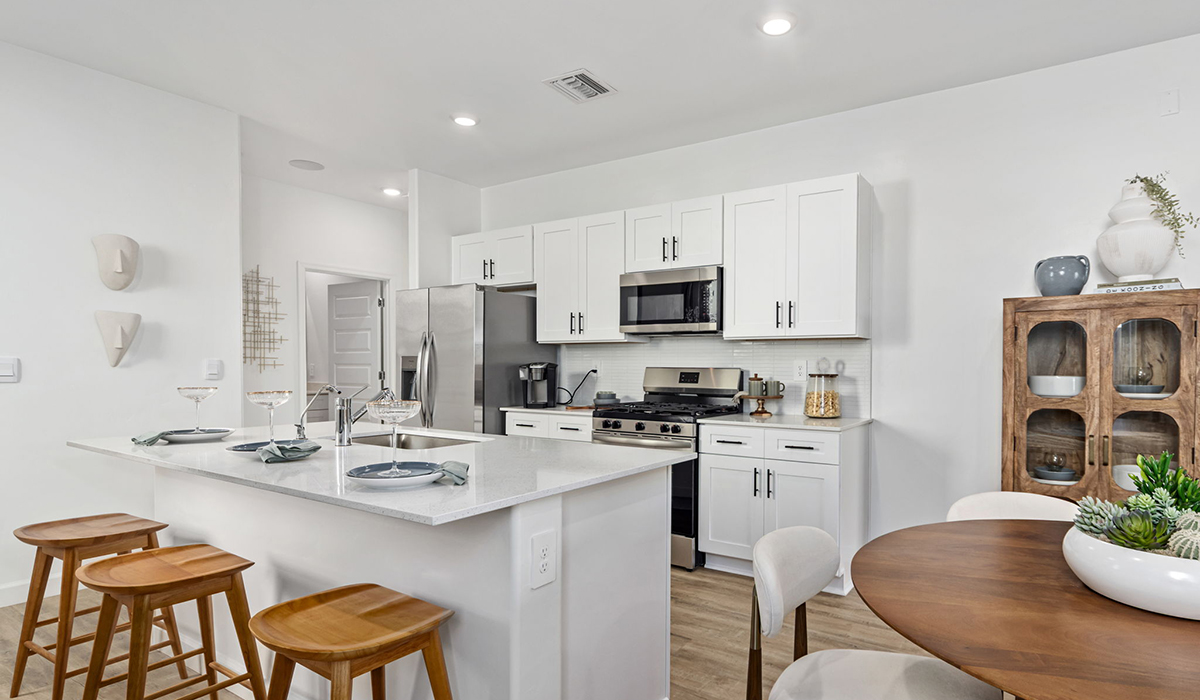 Introducing the Carolina — a thoughtfully designed single-story home offering 1,536 sq. ft. of modern comfort at Redford Estates in Southwest Tucson, Arizona.  With three bedrooms, two full bathrooms, and a two-car garage, this efficient and beautifully planned layout is perfect for those seeking convenience, comfort, and single-level living.  A welcoming front porch invites you inside, where the entryway opens into a bright and beautifully crafted living space. The heart of the home is the well-appointed kitchen, featuring a large center island, walk-in pantry, and stylish Shaker-style cabinetry.  Overlooking the dining area and great room, this open layout makes it easy to cook, gather, and entertain with ease.  The primary bedroom is thoughtfully positioned at the rear of the home, creating a private retreat. Complete with a large en-suite bathroom and walk-in closet, it's designed for relaxation and convenience.  Two additional bedrooms are located toward the front of the home, offering flexibility for family, guests, a home office, or hobbies, and share a full secondary hallway bathroom.  Our homes at Redford Estates are designed with the future in mind. Each home features a Spanish lace stucco exterior, landscaped front yards with auto drip irrigation, and large backyards that are fully fenced and ready for your personal touch. Inside, the Home is Connected® Smart Home package brings modern convenience to your fingertips with a smart thermostat, video doorbell, keyless entry, and a Wi-Fi-enabled garage door opener.  With its smart layout, modern features, and effortless single-story living, the Carolina brings comfort and functionality together in a one beautifully designed home here at Redford Estates.  *Images shown are for reference only. They depict the Carolina model home and may not represent the actual home.