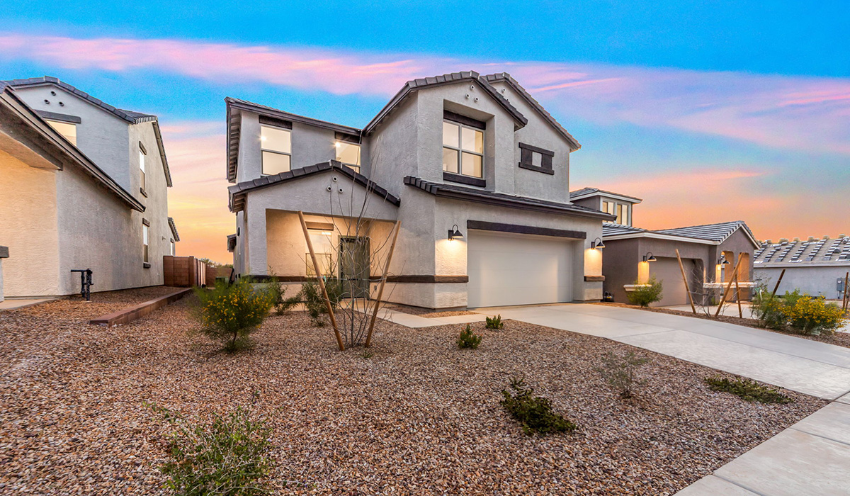 Welcome to The Oasis at Rocking K, a premier D.R. Horton new home community nestled in the picturesque landscapes of Vail, Arizona, where new homes blend seamlessly with the breathtaking surroundings of the Rincon Mountains. Experience the perfect balance of tranquility and modern convenience in this master-planned neighborhood, designed to offer a lifestyle that caters to families, nature enthusiasts, and anyone seeking a peaceful yet connected community.  The Oasis at Rocking K features five beautifully designed one-story floor plans ranging from 1,400 to 1,900 square feet, each crafted with the high-quality features and finishes D.R. Horton is known for. Homes in Rocking K feature a Spanish lace stucco exterior, tile roofs, and meticulously landscaped front yards with auto drip irrigation. Inside, you’ll find luxurious quartz countertops in the kitchens and bathrooms, 42” shaker-style cabinets with modern cabinet pulls, and wood-look tile flooring throughout the main living areas. Homes also include covered front porches and back patios, perfect for enjoying Arizona’s stunning sunsets and clear night skies.  Each home in The Oasis at Rocking K is equipped with D.R. Horton’s Home is Connected® Smart Home package, which includes a smart thermostat, video doorbell, keyless entry, Wi-Fi-enabled garage door opener, and Deako light switches. Additionally, these homes meet the stringent DOE Zero Energy Ready Home standards, making them not only comfortable and modern but also exceptionally energy-efficient. With features like spray foam insulation, tankless water heaters and LED lighting, these homes are designed to reduce your environmental footprint and provide long-term savings on energy costs.  Living at Rocking K means being part of a vibrant, family-oriented community with a strong sense of connection among residents. The Oasis at Rocking K offers a variety of amenities, including ramadas, picnic tables, and grassy areas perfect for gatherings. Residents also have access to the greater Rocking K master-planned neighborhood amenities, such as a splashpad, large event lawn, walking paths, multipurpose fields, basketball and pickleball courts, and an innovative playground with a zip-line and jungle gym. The new K-8 school, set to open in 2025, is just one of the many features that make Rocking K ideal for families.  Life at Rocking K is further enriched by a lively calendar of lifestyle events, thoughtfully organized by the Rocking K Homeowners Association. These events are a cornerstone of community life, fostering a strong sense of connection among residents. Whether you’re looking to enjoy a quiet evening star gazing in the park or engage in fun activities with neighbors, there’s always something happening. The quarterly lifestyle calendar is packed with regular and seasonal events, including movie nights in the park, sports and summer camps for kids, and wine tasting events for adults. Families can join hiking groups, participate in trivia nights, or enjoy the various holiday celebrations. The community comes alive during the holidays with loads of themed events, arts and crafts fairs, and car shows. Rocking K’s commitment to providing a dynamic and engaging environment ensures that there’s always an opportunity to make memories and build lasting friendships right in your neighborhood.   Residents of Rocking K benefit from easy access to I-10, making commutes to Tucson and surrounding areas a breeze. The community is close to major employers such as Davis-Monthan Air Force Base, Raytheon, and the University of Arizona, as well as top-notch healthcare facilities like TMC Rincon and Northwest Hospital East. The nearby Houghton Town Center and Houghton Rd. business corridor offer convenient shopping, dining, and services.  For outdoor enthusiasts, Rocking K is surrounded by natural beauty and recreational opportunities. Explore the hiking and biking trails at Colossal Cave Mountain Park, Saguaro National Park East, and the Arizona Trail. Enjoy golfing at Del Lago Golf Course, or take a short drive to Sonoita for a day trip to Arizona’s Wine Country. Whether it’s hiking, camping, or simply taking in the stunning views, Rocking K is your gateway to the great outdoors.  With 360-degree mountain views, calm and quiet evenings, and a location that’s close to everything you need, Rocking K is truly a community where you can thrive. Experience the best of Arizona living at The Oasis at Rocking K, where your new home awaits in a community that offers everything you need for a fulfilling lifestyle.