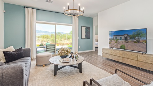 Welcome to The Oasis at Rocking K, a premier D.R. Horton new home community nestled in the picturesque landscapes of Vail, Arizona, where new homes blend seamlessly with the breathtaking surroundings of the Rincon Mountains. Experience the perfect balance of tranquility and modern convenience in this master-planned neighborhood, designed to offer a lifestyle that caters to families, nature enthusiasts, and anyone seeking a peaceful yet connected community. The Oasis at Rocking K features five beautifully designed one-story floor plans ranging from 1,400 to 1,900 square feet, each crafted with the high-quality features and finishes D.R. Horton is known for. Homes in Rocking K feature a Spanish lace stucco exterior, tile roofs, and meticulously landscaped front yards with auto drip irrigation. Inside, you’ll find luxurious quartz countertops in the kitchens and bathrooms, 42” shaker-style cabinets with modern cabinet pulls, and wood-look tile flooring throughout the main living areas. Homes also include covered front porches and back patios, perfect for enjoying Arizona’s stunning sunsets and clear night skies. Each home in The Oasis at Rocking K is equipped with D.R. Horton’s Home is Connected® Smart Home package, which includes a smart thermostat, video doorbell, keyless entry, Wi-Fi-enabled garage door opener, and Deako light switches. Additionally, these homes meet the stringent DOE Zero Energy Ready Home standards, making them not only comfortable and modern but also exceptionally energy-efficient. With features like spray foam insulation, tankless water heaters and LED lighting, these homes are designed to reduce your environmental footprint and provide long-term savings on energy costs. Living at Rocking K means being part of a vibrant, family-oriented community with a strong sense of connection among residents. The Oasis at Rocking K offers a variety of amenities, including ramadas, picnic tables, and grassy areas perfect for gatherings. Residents also have access to the greater Rocking K master-planned neighborhood amenities, such as a splashpad, large event lawn, walking paths, multipurpose fields, basketball and pickleball courts, and an innovative playground with a zip-line and jungle gym. The new K-8 school, set to open in 2025, is just one of the many features that make Rocking K ideal for families. Life at Rocking K is further enriched by a lively calendar of lifestyle events, thoughtfully organized by the Rocking K Homeowners Association. These events are a cornerstone of community life, fostering a strong sense of connection among residents. Whether you’re looking to enjoy a quiet evening star gazing in the park or engage in fun activities with neighbors, there’s always something happening. The quarterly lifestyle calendar is packed with regular and seasonal events, including movie nights in the park, sports and summer camps for kids, and wine tasting events for adults. Families can join hiking groups, participate in trivia nights, or enjoy the various holiday celebrations. The community comes alive during the holidays with loads of themed events, arts and crafts fairs, and car shows. Rocking K’s commitment to providing a dynamic and engaging environment ensures that there’s always an opportunity to make memories and build lasting friendships right in your neighborhood. Residents of Rocking K benefit from easy access to I-10, making commutes to Tucson and surrounding areas a breeze. The community is close to major employers such as Davis-Monthan Air Force Base, Raytheon, and the University of Arizona, as well as top-notch healthcare facilities like TMC Rincon and Northwest Hospital East. The nearby Houghton Town Center and Houghton Rd. business corridor offer convenient shopping, dining, and services. For outdoor enthusiasts, Rocking K is surrounded by natural beauty and recreational opportunities. Explore the hiking and biking trails at Colossal Cave Mountain Park, Saguaro National Park East, and the Arizona Trail. Enjoy golfing at Del Lago Golf Course, or take a short drive to Sonoita for a day trip to Arizona’s Wine Country. Whether it’s hiking, camping, or simply taking in the stunning views, Rocking K is your gateway to the great outdoors. With 360-degree mountain views, calm and quiet evenings, and a location that’s close to everything you need, Rocking K is truly a community where you can thrive. Experience the best of Arizona living at The Oasis at Rocking K, where your new home awaits in a community that offers everything you need for a fulfilling lifestyle.