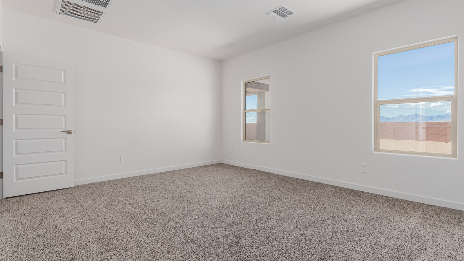 Introducing The River plan at The Oasis at Rocking K, a standout two-story new home that epitomizes spacious living and modern amenities in the scenic backdrop of Vail, Arizona. Nestled within this master-planned community, The River offers an impressive 2,396 square feet of living space, making it the largest floorplan available at The Oasis. This home is intentionally designed to accommodate the needs of growing families, with five bedrooms and three bathrooms, ensuring plenty of space for everyone.  The exterior of The River plan exudes charm and character, with its Spanish lace stucco finish and tile roof that blends seamlessly into the picturesque surroundings. The home’s front yard is meticulously landscaped with auto drip irrigation, providing a welcoming entrance to this beautiful residence.  Upon entering The River, you'll be greeted by a bright and inviting great room that flows effortlessly into the dining room and kitchen, creating a harmonious space perfect for entertaining or family gatherings. The kitchen is a chef’s day dream, featuring quartz countertops, 42” shaker-style cabinets, and stainless steel appliances, all designed to inspire culinary creativity. The main floor also includes the luxurious owner’s suite, which serves as a private sanctuary. This suite features a spacious walk-in closet and an en-suite bathroom with dual vanities, a walk-in shower, and a soaking tub, providing the perfect retreat at the end of the day. Additionally, a second bedroom on the main floor offers flexibility, ideal for guests or a home office.  As you ascend to the second story, you'll find three additional bedrooms, all with easy access to a full bathroom. A generous loft area on the second floor offers additional living space, ideal for a media room, play area, or home gym.  The River plan is not just about style and space; it’s also about modern convenience and energy efficiency. The home is equipped with D.R. Horton’s Home is Connected® Smart Home package, which includes a smart thermostat, video doorbell, keyless entry, Wi-Fi-enabled garage door opener, and Deako light switches, ensuring that your home is as functional as it is beautiful. Additionally, the home meets the DOE Zero Energy Ready Home standards, featuring energy-efficient elements such as spray foam insulation, a tankless water heater, LED lighting throughout and more.  Living at The Oasis at Rocking K means more than just owning a home; it means being part of a vibrant community. With access to amenities like ramadas, picnic areas, walking paths, and recreational fields, plus the greater Rocking K master-planned neighborhood’s splashpad, event lawn, playground, and events, there’s always something to do. Residents also enjoy the convenience of nearby schools, shopping, dining, and outdoor recreational opportunities, making The Oasis at Rocking K the perfect place to call home.  The River plan at The Oasis at Rocking K is where space, style, and smart living converge, offering a home designed for the way you live today.