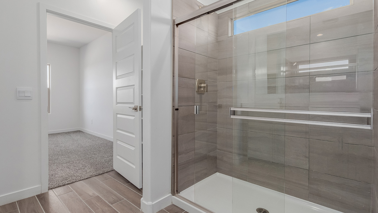 Introducing The River plan at The Oasis at Rocking K, a standout two-story new home that epitomizes spacious living and modern amenities in the scenic backdrop of Vail, Arizona. Nestled within this master-planned community, The River offers an impressive 2,396 square feet of living space, making it the largest floorplan available at The Oasis. This home is intentionally designed to accommodate the needs of growing families, with five bedrooms and three bathrooms, ensuring plenty of space for everyone.  The exterior of The River plan exudes charm and character, with its Spanish lace stucco finish and tile roof that blends seamlessly into the picturesque surroundings. The home’s front yard is meticulously landscaped with auto drip irrigation, providing a welcoming entrance to this beautiful residence.  Upon entering The River, you'll be greeted by a bright and inviting great room that flows effortlessly into the dining room and kitchen, creating a harmonious space perfect for entertaining or family gatherings. The kitchen is a chef’s day dream, featuring quartz countertops, 42” shaker-style cabinets, and stainless steel appliances, all designed to inspire culinary creativity. The main floor also includes the luxurious owner’s suite, which serves as a private sanctuary. This suite features a spacious walk-in closet and an en-suite bathroom with dual vanities, a walk-in shower, and a soaking tub, providing the perfect retreat at the end of the day. Additionally, a second bedroom on the main floor offers flexibility, ideal for guests or a home office.  As you ascend to the second story, you'll find three additional bedrooms, all with easy access to a full bathroom. A generous loft area on the second floor offers additional living space, ideal for a media room, play area, or home gym.  The River plan is not just about style and space; it’s also about modern convenience and energy efficiency. The home is equipped with D.R. Horton’s Home is Connected® Smart Home package, which includes a smart thermostat, video doorbell, keyless entry, Wi-Fi-enabled garage door opener, and Deako light switches, ensuring that your home is as functional as it is beautiful. Additionally, the home meets the DOE Zero Energy Ready Home standards, featuring energy-efficient elements such as spray foam insulation, a tankless water heater, LED lighting throughout and more.  Living at The Oasis at Rocking K means more than just owning a home; it means being part of a vibrant community. With access to amenities like ramadas, picnic areas, walking paths, and recreational fields, plus the greater Rocking K master-planned neighborhood’s splashpad, event lawn, playground, and events, there’s always something to do. Residents also enjoy the convenience of nearby schools, shopping, dining, and outdoor recreational opportunities, making The Oasis at Rocking K the perfect place to call home.  The River plan at The Oasis at Rocking K is where space, style, and smart living converge, offering a home designed for the way you live today.