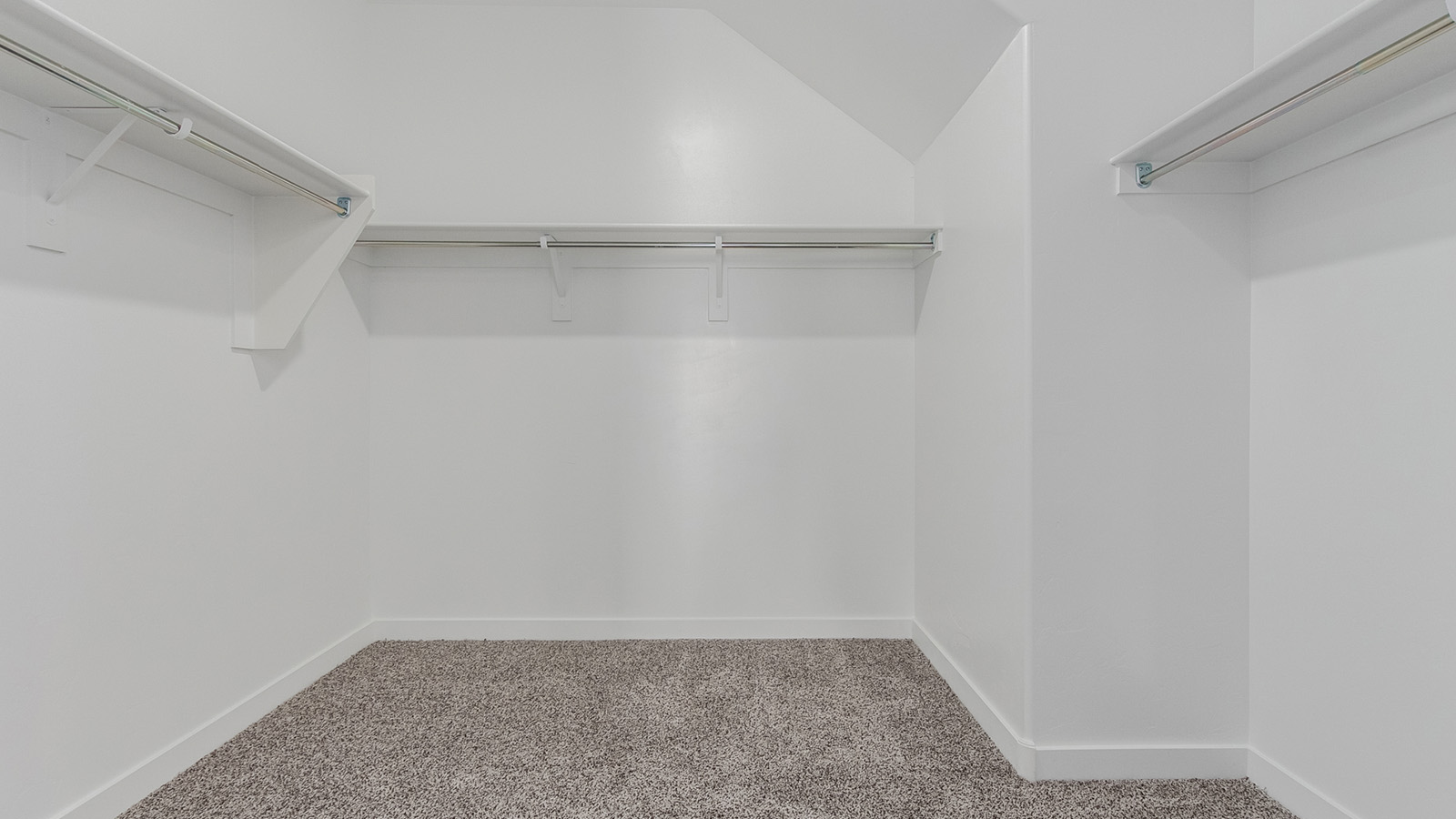 Introducing The River plan at The Oasis at Rocking K, a standout two-story new home that epitomizes spacious living and modern amenities in the scenic backdrop of Vail, Arizona. Nestled within this master-planned community, The River offers an impressive 2,396 square feet of living space, making it the largest floorplan available at The Oasis. This home is intentionally designed to accommodate the needs of growing families, with five bedrooms and three bathrooms, ensuring plenty of space for everyone.  The exterior of The River plan exudes charm and character, with its Spanish lace stucco finish and tile roof that blends seamlessly into the picturesque surroundings. The home’s front yard is meticulously landscaped with auto drip irrigation, providing a welcoming entrance to this beautiful residence.  Upon entering The River, you'll be greeted by a bright and inviting great room that flows effortlessly into the dining room and kitchen, creating a harmonious space perfect for entertaining or family gatherings. The kitchen is a chef’s day dream, featuring quartz countertops, 42” shaker-style cabinets, and stainless steel appliances, all designed to inspire culinary creativity. The main floor also includes the luxurious owner’s suite, which serves as a private sanctuary. This suite features a spacious walk-in closet and an en-suite bathroom with dual vanities, a walk-in shower, and a soaking tub, providing the perfect retreat at the end of the day. Additionally, a second bedroom on the main floor offers flexibility, ideal for guests or a home office.  As you ascend to the second story, you'll find three additional bedrooms, all with easy access to a full bathroom. A generous loft area on the second floor offers additional living space, ideal for a media room, play area, or home gym.  The River plan is not just about style and space; it’s also about modern convenience and energy efficiency. The home is equipped with D.R. Horton’s Home is Connected® Smart Home package, which includes a smart thermostat, video doorbell, keyless entry, Wi-Fi-enabled garage door opener, and Deako light switches, ensuring that your home is as functional as it is beautiful. Additionally, the home meets the DOE Zero Energy Ready Home standards, featuring energy-efficient elements such as spray foam insulation, a tankless water heater, LED lighting throughout and more.  Living at The Oasis at Rocking K means more than just owning a home; it means being part of a vibrant community. With access to amenities like ramadas, picnic areas, walking paths, and recreational fields, plus the greater Rocking K master-planned neighborhood’s splashpad, event lawn, playground, and events, there’s always something to do. Residents also enjoy the convenience of nearby schools, shopping, dining, and outdoor recreational opportunities, making The Oasis at Rocking K the perfect place to call home.  The River plan at The Oasis at Rocking K is where space, style, and smart living converge, offering a home designed for the way you live today.