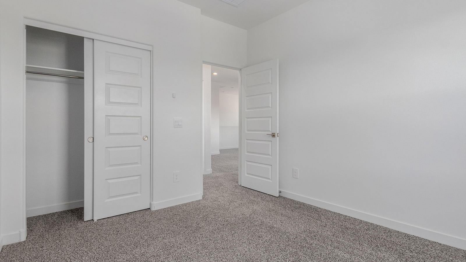 Introducing The River plan at The Oasis at Rocking K, a standout two-story new home that epitomizes spacious living and modern amenities in the scenic backdrop of Vail, Arizona. Nestled within this master-planned community, The River offers an impressive 2,396 square feet of living space, making it the largest floorplan available at The Oasis. This home is intentionally designed to accommodate the needs of growing families, with five bedrooms and three bathrooms, ensuring plenty of space for everyone.  The exterior of The River plan exudes charm and character, with its Spanish lace stucco finish and tile roof that blends seamlessly into the picturesque surroundings. The home’s front yard is meticulously landscaped with auto drip irrigation, providing a welcoming entrance to this beautiful residence.  Upon entering The River, you'll be greeted by a bright and inviting great room that flows effortlessly into the dining room and kitchen, creating a harmonious space perfect for entertaining or family gatherings. The kitchen is a chef’s day dream, featuring quartz countertops, 42” shaker-style cabinets, and stainless steel appliances, all designed to inspire culinary creativity. The main floor also includes the luxurious owner’s suite, which serves as a private sanctuary. This suite features a spacious walk-in closet and an en-suite bathroom with dual vanities, a walk-in shower, and a soaking tub, providing the perfect retreat at the end of the day. Additionally, a second bedroom on the main floor offers flexibility, ideal for guests or a home office.  As you ascend to the second story, you'll find three additional bedrooms, all with easy access to a full bathroom. A generous loft area on the second floor offers additional living space, ideal for a media room, play area, or home gym.  The River plan is not just about style and space; it’s also about modern convenience and energy efficiency. The home is equipped with D.R. Horton’s Home is Connected® Smart Home package, which includes a smart thermostat, video doorbell, keyless entry, Wi-Fi-enabled garage door opener, and Deako light switches, ensuring that your home is as functional as it is beautiful. Additionally, the home meets the DOE Zero Energy Ready Home standards, featuring energy-efficient elements such as spray foam insulation, a tankless water heater, LED lighting throughout and more.  Living at The Oasis at Rocking K means more than just owning a home; it means being part of a vibrant community. With access to amenities like ramadas, picnic areas, walking paths, and recreational fields, plus the greater Rocking K master-planned neighborhood’s splashpad, event lawn, playground, and events, there’s always something to do. Residents also enjoy the convenience of nearby schools, shopping, dining, and outdoor recreational opportunities, making The Oasis at Rocking K the perfect place to call home.  The River plan at The Oasis at Rocking K is where space, style, and smart living converge, offering a home designed for the way you live today.