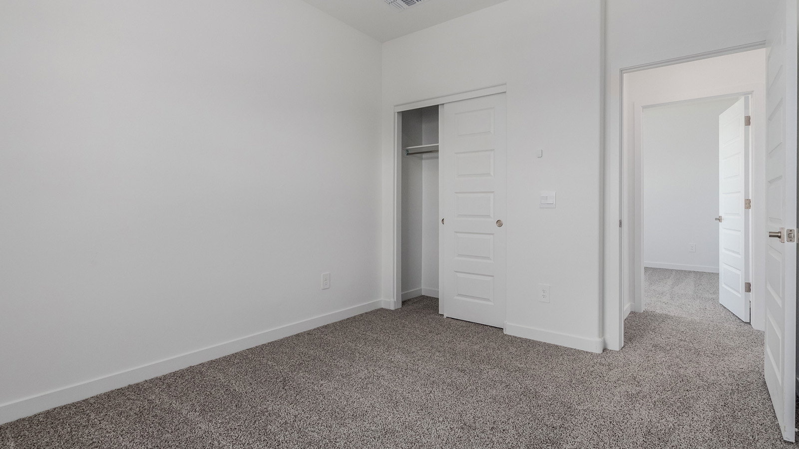 Introducing The River plan at The Oasis at Rocking K, a standout two-story new home that epitomizes spacious living and modern amenities in the scenic backdrop of Vail, Arizona. Nestled within this master-planned community, The River offers an impressive 2,396 square feet of living space, making it the largest floorplan available at The Oasis. This home is intentionally designed to accommodate the needs of growing families, with five bedrooms and three bathrooms, ensuring plenty of space for everyone.  The exterior of The River plan exudes charm and character, with its Spanish lace stucco finish and tile roof that blends seamlessly into the picturesque surroundings. The home’s front yard is meticulously landscaped with auto drip irrigation, providing a welcoming entrance to this beautiful residence.  Upon entering The River, you'll be greeted by a bright and inviting great room that flows effortlessly into the dining room and kitchen, creating a harmonious space perfect for entertaining or family gatherings. The kitchen is a chef’s day dream, featuring quartz countertops, 42” shaker-style cabinets, and stainless steel appliances, all designed to inspire culinary creativity. The main floor also includes the luxurious owner’s suite, which serves as a private sanctuary. This suite features a spacious walk-in closet and an en-suite bathroom with dual vanities, a walk-in shower, and a soaking tub, providing the perfect retreat at the end of the day. Additionally, a second bedroom on the main floor offers flexibility, ideal for guests or a home office.  As you ascend to the second story, you'll find three additional bedrooms, all with easy access to a full bathroom. A generous loft area on the second floor offers additional living space, ideal for a media room, play area, or home gym.  The River plan is not just about style and space; it’s also about modern convenience and energy efficiency. The home is equipped with D.R. Horton’s Home is Connected® Smart Home package, which includes a smart thermostat, video doorbell, keyless entry, Wi-Fi-enabled garage door opener, and Deako light switches, ensuring that your home is as functional as it is beautiful. Additionally, the home meets the DOE Zero Energy Ready Home standards, featuring energy-efficient elements such as spray foam insulation, a tankless water heater, LED lighting throughout and more.  Living at The Oasis at Rocking K means more than just owning a home; it means being part of a vibrant community. With access to amenities like ramadas, picnic areas, walking paths, and recreational fields, plus the greater Rocking K master-planned neighborhood’s splashpad, event lawn, playground, and events, there’s always something to do. Residents also enjoy the convenience of nearby schools, shopping, dining, and outdoor recreational opportunities, making The Oasis at Rocking K the perfect place to call home.  The River plan at The Oasis at Rocking K is where space, style, and smart living converge, offering a home designed for the way you live today.