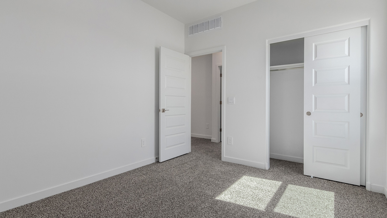 Introducing The River plan at The Oasis at Rocking K, a standout two-story new home that epitomizes spacious living and modern amenities in the scenic backdrop of Vail, Arizona. Nestled within this master-planned community, The River offers an impressive 2,396 square feet of living space, making it the largest floorplan available at The Oasis. This home is intentionally designed to accommodate the needs of growing families, with five bedrooms and three bathrooms, ensuring plenty of space for everyone.  The exterior of The River plan exudes charm and character, with its Spanish lace stucco finish and tile roof that blends seamlessly into the picturesque surroundings. The home’s front yard is meticulously landscaped with auto drip irrigation, providing a welcoming entrance to this beautiful residence.  Upon entering The River, you'll be greeted by a bright and inviting great room that flows effortlessly into the dining room and kitchen, creating a harmonious space perfect for entertaining or family gatherings. The kitchen is a chef’s day dream, featuring quartz countertops, 42” shaker-style cabinets, and stainless steel appliances, all designed to inspire culinary creativity. The main floor also includes the luxurious owner’s suite, which serves as a private sanctuary. This suite features a spacious walk-in closet and an en-suite bathroom with dual vanities, a walk-in shower, and a soaking tub, providing the perfect retreat at the end of the day. Additionally, a second bedroom on the main floor offers flexibility, ideal for guests or a home office.  As you ascend to the second story, you'll find three additional bedrooms, all with easy access to a full bathroom. A generous loft area on the second floor offers additional living space, ideal for a media room, play area, or home gym.  The River plan is not just about style and space; it’s also about modern convenience and energy efficiency. The home is equipped with D.R. Horton’s Home is Connected® Smart Home package, which includes a smart thermostat, video doorbell, keyless entry, Wi-Fi-enabled garage door opener, and Deako light switches, ensuring that your home is as functional as it is beautiful. Additionally, the home meets the DOE Zero Energy Ready Home standards, featuring energy-efficient elements such as spray foam insulation, a tankless water heater, LED lighting throughout and more.  Living at The Oasis at Rocking K means more than just owning a home; it means being part of a vibrant community. With access to amenities like ramadas, picnic areas, walking paths, and recreational fields, plus the greater Rocking K master-planned neighborhood’s splashpad, event lawn, playground, and events, there’s always something to do. Residents also enjoy the convenience of nearby schools, shopping, dining, and outdoor recreational opportunities, making The Oasis at Rocking K the perfect place to call home.  The River plan at The Oasis at Rocking K is where space, style, and smart living converge, offering a home designed for the way you live today.