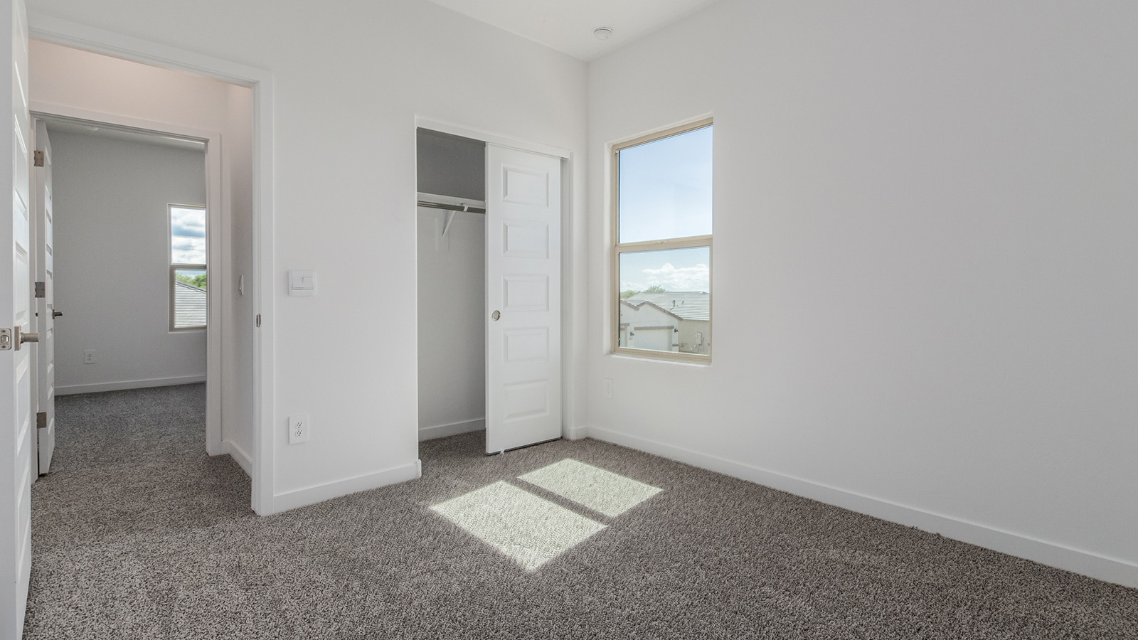 Introducing The River plan at The Oasis at Rocking K, a standout two-story new home that epitomizes spacious living and modern amenities in the scenic backdrop of Vail, Arizona. Nestled within this master-planned community, The River offers an impressive 2,396 square feet of living space, making it the largest floorplan available at The Oasis. This home is intentionally designed to accommodate the needs of growing families, with five bedrooms and three bathrooms, ensuring plenty of space for everyone.  The exterior of The River plan exudes charm and character, with its Spanish lace stucco finish and tile roof that blends seamlessly into the picturesque surroundings. The home’s front yard is meticulously landscaped with auto drip irrigation, providing a welcoming entrance to this beautiful residence.  Upon entering The River, you'll be greeted by a bright and inviting great room that flows effortlessly into the dining room and kitchen, creating a harmonious space perfect for entertaining or family gatherings. The kitchen is a chef’s day dream, featuring quartz countertops, 42” shaker-style cabinets, and stainless steel appliances, all designed to inspire culinary creativity. The main floor also includes the luxurious owner’s suite, which serves as a private sanctuary. This suite features a spacious walk-in closet and an en-suite bathroom with dual vanities, a walk-in shower, and a soaking tub, providing the perfect retreat at the end of the day. Additionally, a second bedroom on the main floor offers flexibility, ideal for guests or a home office.  As you ascend to the second story, you'll find three additional bedrooms, all with easy access to a full bathroom. A generous loft area on the second floor offers additional living space, ideal for a media room, play area, or home gym.  The River plan is not just about style and space; it’s also about modern convenience and energy efficiency. The home is equipped with D.R. Horton’s Home is Connected® Smart Home package, which includes a smart thermostat, video doorbell, keyless entry, Wi-Fi-enabled garage door opener, and Deako light switches, ensuring that your home is as functional as it is beautiful. Additionally, the home meets the DOE Zero Energy Ready Home standards, featuring energy-efficient elements such as spray foam insulation, a tankless water heater, LED lighting throughout and more.  Living at The Oasis at Rocking K means more than just owning a home; it means being part of a vibrant community. With access to amenities like ramadas, picnic areas, walking paths, and recreational fields, plus the greater Rocking K master-planned neighborhood’s splashpad, event lawn, playground, and events, there’s always something to do. Residents also enjoy the convenience of nearby schools, shopping, dining, and outdoor recreational opportunities, making The Oasis at Rocking K the perfect place to call home.  The River plan at The Oasis at Rocking K is where space, style, and smart living converge, offering a home designed for the way you live today.