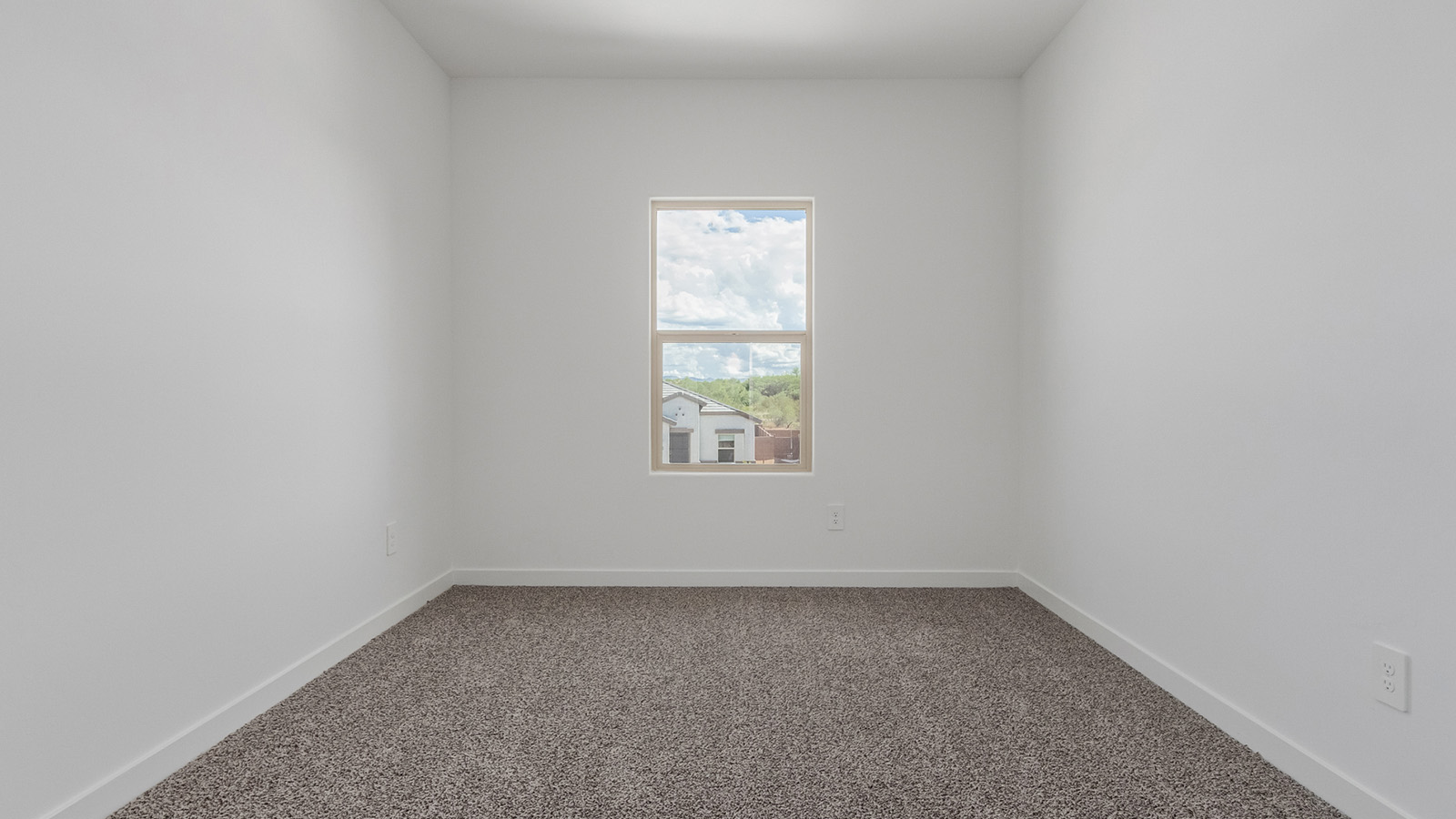 Introducing The River plan at The Oasis at Rocking K, a standout two-story new home that epitomizes spacious living and modern amenities in the scenic backdrop of Vail, Arizona. Nestled within this master-planned community, The River offers an impressive 2,396 square feet of living space, making it the largest floorplan available at The Oasis. This home is intentionally designed to accommodate the needs of growing families, with five bedrooms and three bathrooms, ensuring plenty of space for everyone.  The exterior of The River plan exudes charm and character, with its Spanish lace stucco finish and tile roof that blends seamlessly into the picturesque surroundings. The home’s front yard is meticulously landscaped with auto drip irrigation, providing a welcoming entrance to this beautiful residence.  Upon entering The River, you'll be greeted by a bright and inviting great room that flows effortlessly into the dining room and kitchen, creating a harmonious space perfect for entertaining or family gatherings. The kitchen is a chef’s day dream, featuring quartz countertops, 42” shaker-style cabinets, and stainless steel appliances, all designed to inspire culinary creativity. The main floor also includes the luxurious owner’s suite, which serves as a private sanctuary. This suite features a spacious walk-in closet and an en-suite bathroom with dual vanities, a walk-in shower, and a soaking tub, providing the perfect retreat at the end of the day. Additionally, a second bedroom on the main floor offers flexibility, ideal for guests or a home office.  As you ascend to the second story, you'll find three additional bedrooms, all with easy access to a full bathroom. A generous loft area on the second floor offers additional living space, ideal for a media room, play area, or home gym.  The River plan is not just about style and space; it’s also about modern convenience and energy efficiency. The home is equipped with D.R. Horton’s Home is Connected® Smart Home package, which includes a smart thermostat, video doorbell, keyless entry, Wi-Fi-enabled garage door opener, and Deako light switches, ensuring that your home is as functional as it is beautiful. Additionally, the home meets the DOE Zero Energy Ready Home standards, featuring energy-efficient elements such as spray foam insulation, a tankless water heater, LED lighting throughout and more.  Living at The Oasis at Rocking K means more than just owning a home; it means being part of a vibrant community. With access to amenities like ramadas, picnic areas, walking paths, and recreational fields, plus the greater Rocking K master-planned neighborhood’s splashpad, event lawn, playground, and events, there’s always something to do. Residents also enjoy the convenience of nearby schools, shopping, dining, and outdoor recreational opportunities, making The Oasis at Rocking K the perfect place to call home.  The River plan at The Oasis at Rocking K is where space, style, and smart living converge, offering a home designed for the way you live today.