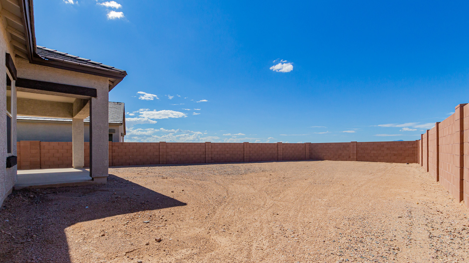 Introducing The River plan at The Oasis at Rocking K, a standout two-story new home that epitomizes spacious living and modern amenities in the scenic backdrop of Vail, Arizona. Nestled within this master-planned community, The River offers an impressive 2,396 square feet of living space, making it the largest floorplan available at The Oasis. This home is intentionally designed to accommodate the needs of growing families, with five bedrooms and three bathrooms, ensuring plenty of space for everyone.  The exterior of The River plan exudes charm and character, with its Spanish lace stucco finish and tile roof that blends seamlessly into the picturesque surroundings. The home’s front yard is meticulously landscaped with auto drip irrigation, providing a welcoming entrance to this beautiful residence.  Upon entering The River, you'll be greeted by a bright and inviting great room that flows effortlessly into the dining room and kitchen, creating a harmonious space perfect for entertaining or family gatherings. The kitchen is a chef’s day dream, featuring quartz countertops, 42” shaker-style cabinets, and stainless steel appliances, all designed to inspire culinary creativity. The main floor also includes the luxurious owner’s suite, which serves as a private sanctuary. This suite features a spacious walk-in closet and an en-suite bathroom with dual vanities, a walk-in shower, and a soaking tub, providing the perfect retreat at the end of the day. Additionally, a second bedroom on the main floor offers flexibility, ideal for guests or a home office.  As you ascend to the second story, you'll find three additional bedrooms, all with easy access to a full bathroom. A generous loft area on the second floor offers additional living space, ideal for a media room, play area, or home gym.  The River plan is not just about style and space; it’s also about modern convenience and energy efficiency. The home is equipped with D.R. Horton’s Home is Connected® Smart Home package, which includes a smart thermostat, video doorbell, keyless entry, Wi-Fi-enabled garage door opener, and Deako light switches, ensuring that your home is as functional as it is beautiful. Additionally, the home meets the DOE Zero Energy Ready Home standards, featuring energy-efficient elements such as spray foam insulation, a tankless water heater, LED lighting throughout and more.  Living at The Oasis at Rocking K means more than just owning a home; it means being part of a vibrant community. With access to amenities like ramadas, picnic areas, walking paths, and recreational fields, plus the greater Rocking K master-planned neighborhood’s splashpad, event lawn, playground, and events, there’s always something to do. Residents also enjoy the convenience of nearby schools, shopping, dining, and outdoor recreational opportunities, making The Oasis at Rocking K the perfect place to call home.  The River plan at The Oasis at Rocking K is where space, style, and smart living converge, offering a home designed for the way you live today.