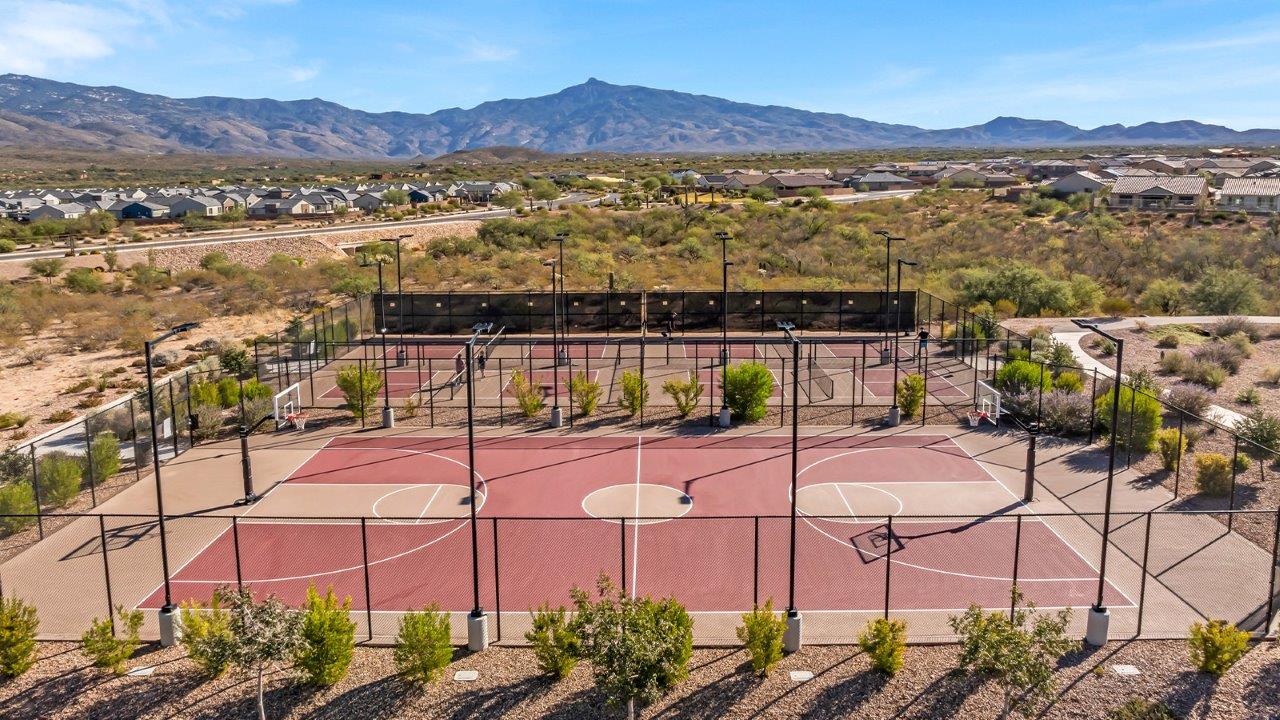 Introducing The River plan at The Oasis at Rocking K, a standout two-story new home that epitomizes spacious living and modern amenities in the scenic backdrop of Vail, Arizona. Nestled within this master-planned community, The River offers an impressive 2,396 square feet of living space, making it the largest floorplan available at The Oasis. This home is intentionally designed to accommodate the needs of growing families, with five bedrooms and three bathrooms, ensuring plenty of space for everyone.  The exterior of The River plan exudes charm and character, with its Spanish lace stucco finish and tile roof that blends seamlessly into the picturesque surroundings. The home’s front yard is meticulously landscaped with auto drip irrigation, providing a welcoming entrance to this beautiful residence.  Upon entering The River, you'll be greeted by a bright and inviting great room that flows effortlessly into the dining room and kitchen, creating a harmonious space perfect for entertaining or family gatherings. The kitchen is a chef’s day dream, featuring quartz countertops, 42” shaker-style cabinets, and stainless steel appliances, all designed to inspire culinary creativity. The main floor also includes the luxurious owner’s suite, which serves as a private sanctuary. This suite features a spacious walk-in closet and an en-suite bathroom with dual vanities, a walk-in shower, and a soaking tub, providing the perfect retreat at the end of the day. Additionally, a second bedroom on the main floor offers flexibility, ideal for guests or a home office.  As you ascend to the second story, you'll find three additional bedrooms, all with easy access to a full bathroom. A generous loft area on the second floor offers additional living space, ideal for a media room, play area, or home gym.  The River plan is not just about style and space; it’s also about modern convenience and energy efficiency. The home is equipped with D.R. Horton’s Home is Connected® Smart Home package, which includes a smart thermostat, video doorbell, keyless entry, Wi-Fi-enabled garage door opener, and Deako light switches, ensuring that your home is as functional as it is beautiful. Additionally, the home meets the DOE Zero Energy Ready Home standards, featuring energy-efficient elements such as spray foam insulation, a tankless water heater, LED lighting throughout and more.  Living at The Oasis at Rocking K means more than just owning a home; it means being part of a vibrant community. With access to amenities like ramadas, picnic areas, walking paths, and recreational fields, plus the greater Rocking K master-planned neighborhood’s splashpad, event lawn, playground, and events, there’s always something to do. Residents also enjoy the convenience of nearby schools, shopping, dining, and outdoor recreational opportunities, making The Oasis at Rocking K the perfect place to call home.  The River plan at The Oasis at Rocking K is where space, style, and smart living converge, offering a home designed for the way you live today.