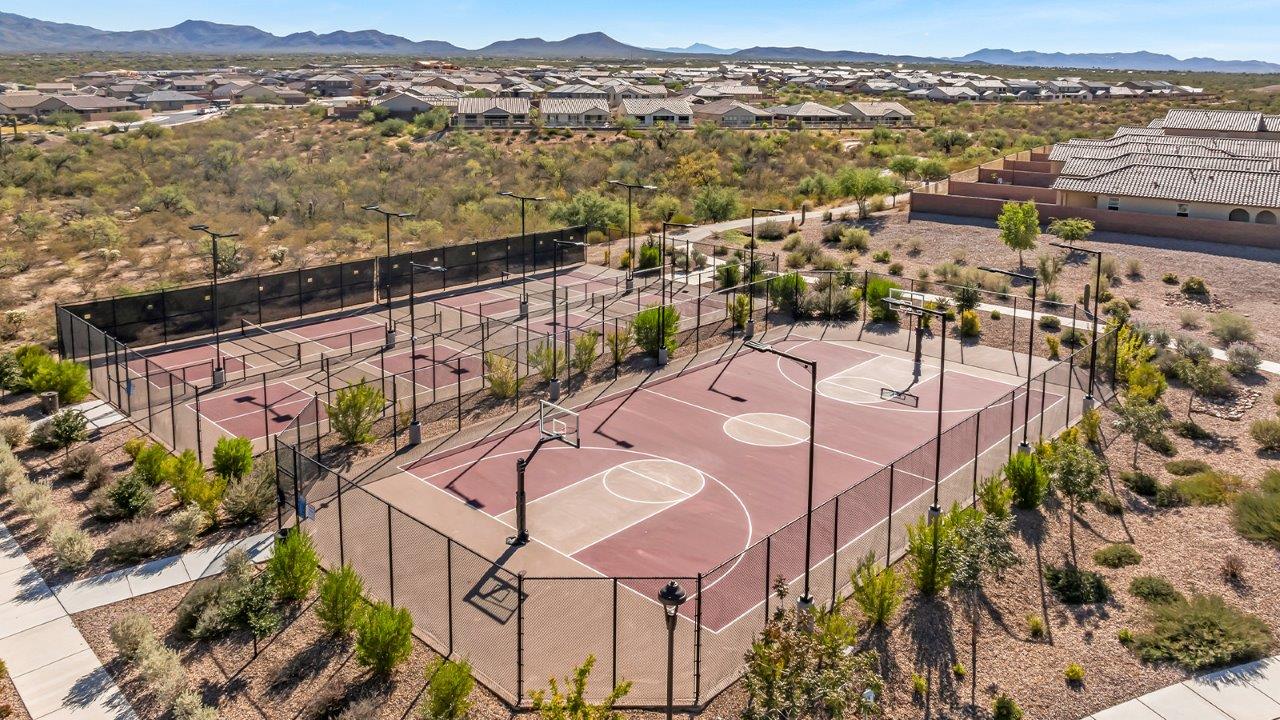 Introducing The River plan at The Oasis at Rocking K, a standout two-story new home that epitomizes spacious living and modern amenities in the scenic backdrop of Vail, Arizona. Nestled within this master-planned community, The River offers an impressive 2,396 square feet of living space, making it the largest floorplan available at The Oasis. This home is intentionally designed to accommodate the needs of growing families, with five bedrooms and three bathrooms, ensuring plenty of space for everyone.  The exterior of The River plan exudes charm and character, with its Spanish lace stucco finish and tile roof that blends seamlessly into the picturesque surroundings. The home’s front yard is meticulously landscaped with auto drip irrigation, providing a welcoming entrance to this beautiful residence.  Upon entering The River, you'll be greeted by a bright and inviting great room that flows effortlessly into the dining room and kitchen, creating a harmonious space perfect for entertaining or family gatherings. The kitchen is a chef’s day dream, featuring quartz countertops, 42” shaker-style cabinets, and stainless steel appliances, all designed to inspire culinary creativity. The main floor also includes the luxurious owner’s suite, which serves as a private sanctuary. This suite features a spacious walk-in closet and an en-suite bathroom with dual vanities, a walk-in shower, and a soaking tub, providing the perfect retreat at the end of the day. Additionally, a second bedroom on the main floor offers flexibility, ideal for guests or a home office.  As you ascend to the second story, you'll find three additional bedrooms, all with easy access to a full bathroom. A generous loft area on the second floor offers additional living space, ideal for a media room, play area, or home gym.  The River plan is not just about style and space; it’s also about modern convenience and energy efficiency. The home is equipped with D.R. Horton’s Home is Connected® Smart Home package, which includes a smart thermostat, video doorbell, keyless entry, Wi-Fi-enabled garage door opener, and Deako light switches, ensuring that your home is as functional as it is beautiful. Additionally, the home meets the DOE Zero Energy Ready Home standards, featuring energy-efficient elements such as spray foam insulation, a tankless water heater, LED lighting throughout and more.  Living at The Oasis at Rocking K means more than just owning a home; it means being part of a vibrant community. With access to amenities like ramadas, picnic areas, walking paths, and recreational fields, plus the greater Rocking K master-planned neighborhood’s splashpad, event lawn, playground, and events, there’s always something to do. Residents also enjoy the convenience of nearby schools, shopping, dining, and outdoor recreational opportunities, making The Oasis at Rocking K the perfect place to call home.  The River plan at The Oasis at Rocking K is where space, style, and smart living converge, offering a home designed for the way you live today.