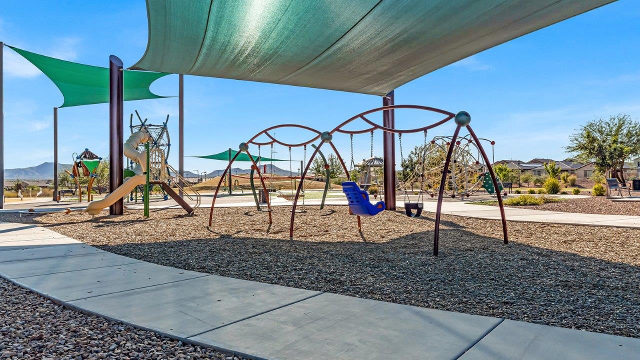 Introducing The River plan at The Oasis at Rocking K, a standout two-story new home that epitomizes spacious living and modern amenities in the scenic backdrop of Vail, Arizona. Nestled within this master-planned community, The River offers an impressive 2,396 square feet of living space, making it the largest floorplan available at The Oasis. This home is intentionally designed to accommodate the needs of growing families, with five bedrooms and three bathrooms, ensuring plenty of space for everyone.  The exterior of The River plan exudes charm and character, with its Spanish lace stucco finish and tile roof that blends seamlessly into the picturesque surroundings. The home’s front yard is meticulously landscaped with auto drip irrigation, providing a welcoming entrance to this beautiful residence.  Upon entering The River, you'll be greeted by a bright and inviting great room that flows effortlessly into the dining room and kitchen, creating a harmonious space perfect for entertaining or family gatherings. The kitchen is a chef’s day dream, featuring quartz countertops, 42” shaker-style cabinets, and stainless steel appliances, all designed to inspire culinary creativity. The main floor also includes the luxurious owner’s suite, which serves as a private sanctuary. This suite features a spacious walk-in closet and an en-suite bathroom with dual vanities, a walk-in shower, and a soaking tub, providing the perfect retreat at the end of the day. Additionally, a second bedroom on the main floor offers flexibility, ideal for guests or a home office.  As you ascend to the second story, you'll find three additional bedrooms, all with easy access to a full bathroom. A generous loft area on the second floor offers additional living space, ideal for a media room, play area, or home gym.  The River plan is not just about style and space; it’s also about modern convenience and energy efficiency. The home is equipped with D.R. Horton’s Home is Connected® Smart Home package, which includes a smart thermostat, video doorbell, keyless entry, Wi-Fi-enabled garage door opener, and Deako light switches, ensuring that your home is as functional as it is beautiful. Additionally, the home meets the DOE Zero Energy Ready Home standards, featuring energy-efficient elements such as spray foam insulation, a tankless water heater, LED lighting throughout and more.  Living at The Oasis at Rocking K means more than just owning a home; it means being part of a vibrant community. With access to amenities like ramadas, picnic areas, walking paths, and recreational fields, plus the greater Rocking K master-planned neighborhood’s splashpad, event lawn, playground, and events, there’s always something to do. Residents also enjoy the convenience of nearby schools, shopping, dining, and outdoor recreational opportunities, making The Oasis at Rocking K the perfect place to call home.  The River plan at The Oasis at Rocking K is where space, style, and smart living converge, offering a home designed for the way you live today.